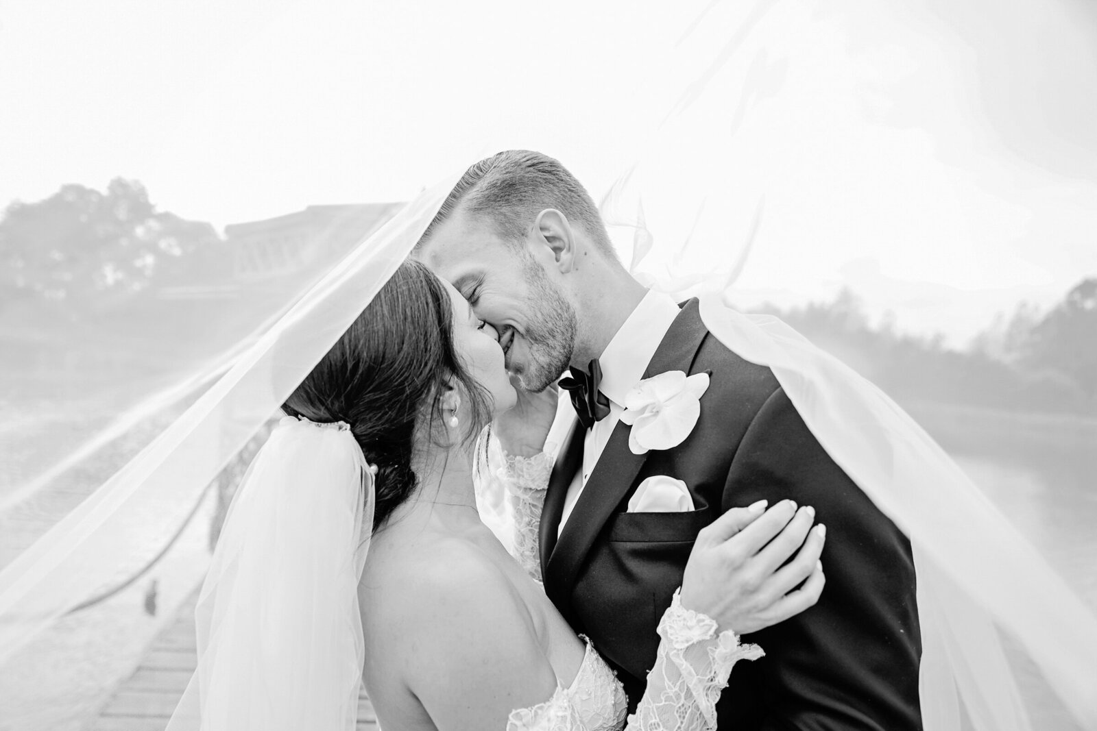 bride-and-groom-under-veil