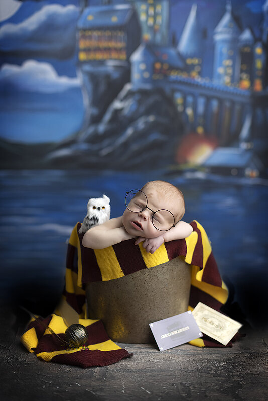 Newborn boy as Harry Potter.