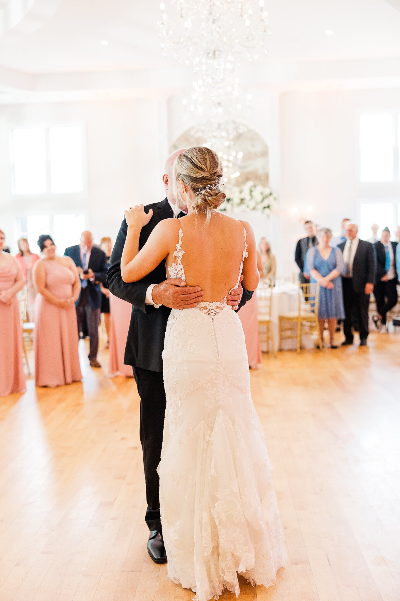 Intimate close-up of bride and groom dancing during first dance at SkyView Golf Club