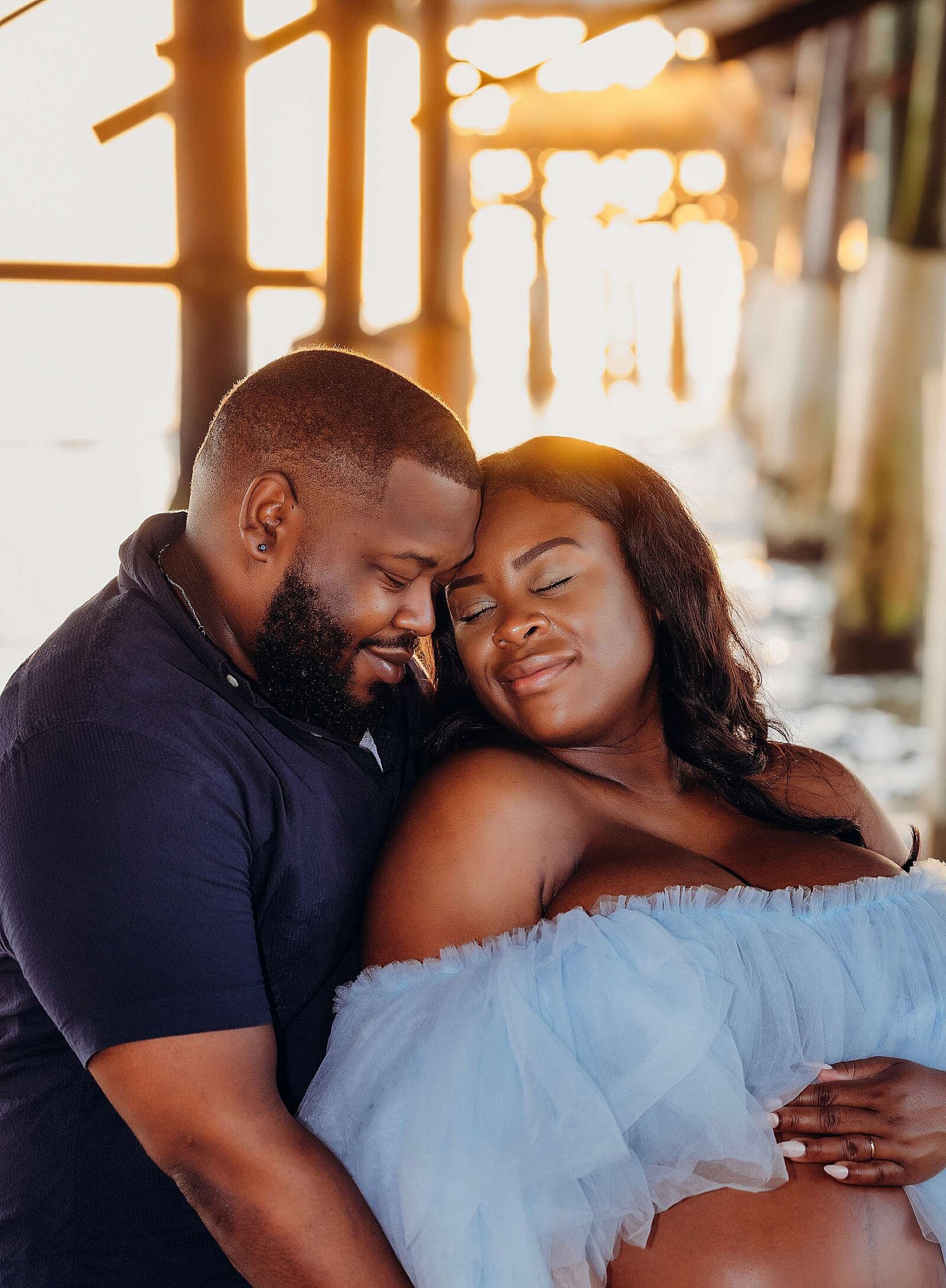 Maternity photography by Bia Schaefer at Cocoa Beach, FL, featuring a radiant mother-to-be in a picturesque seaside setting.