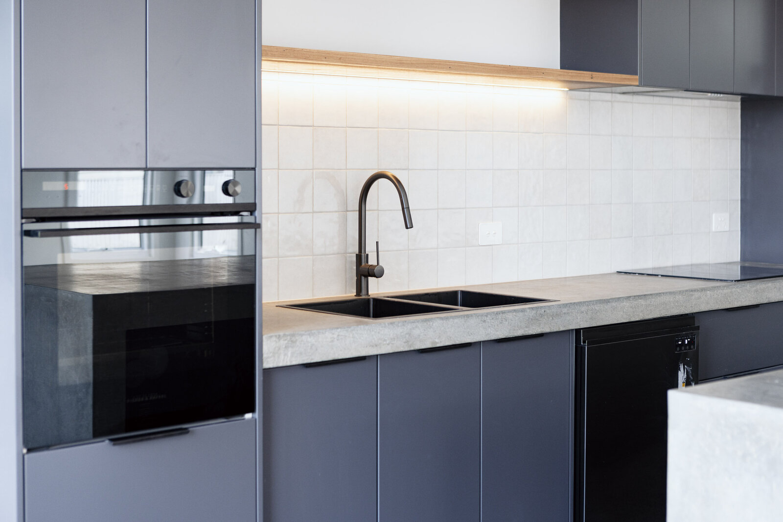 Luxury Kitchen with custom cabinetry in new home build by WBK building