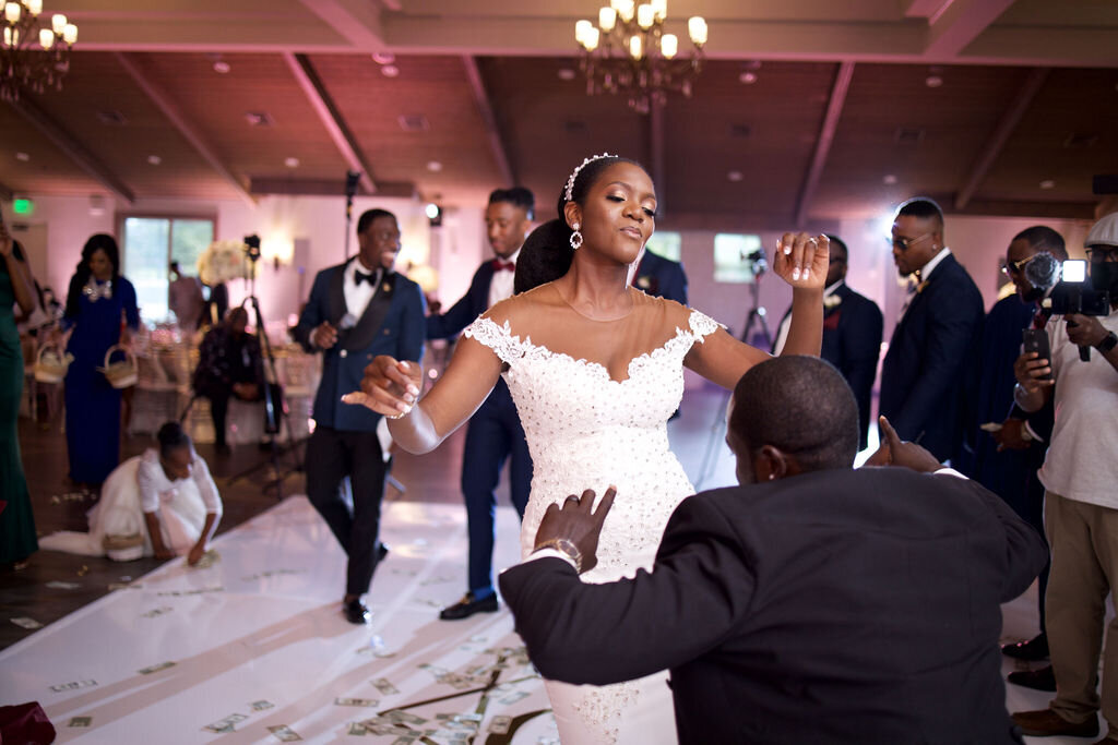 bride and groom dancing on the dance floor at their wedding reception