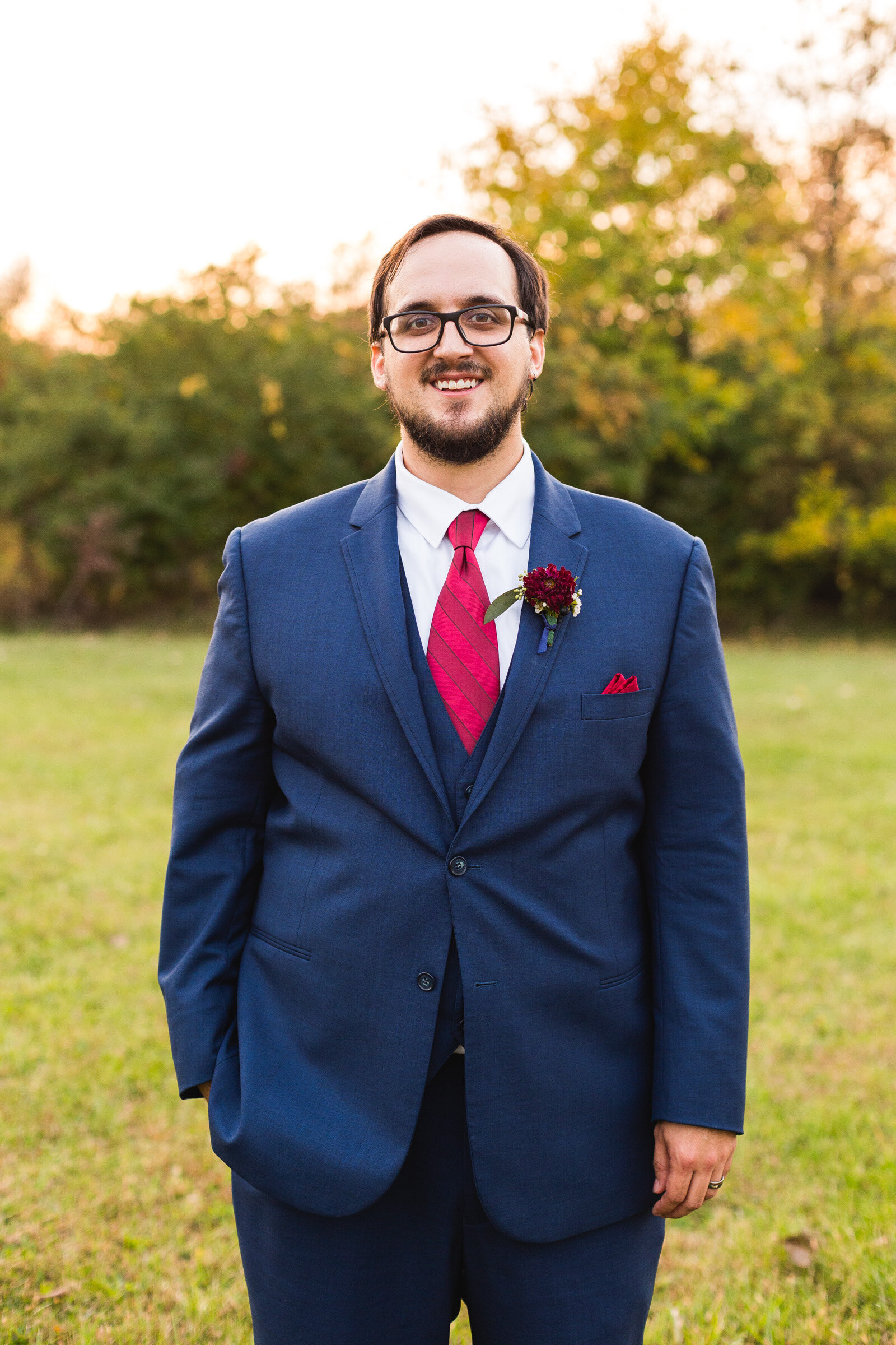 groom posing for wedding portrait fall wedding ohio