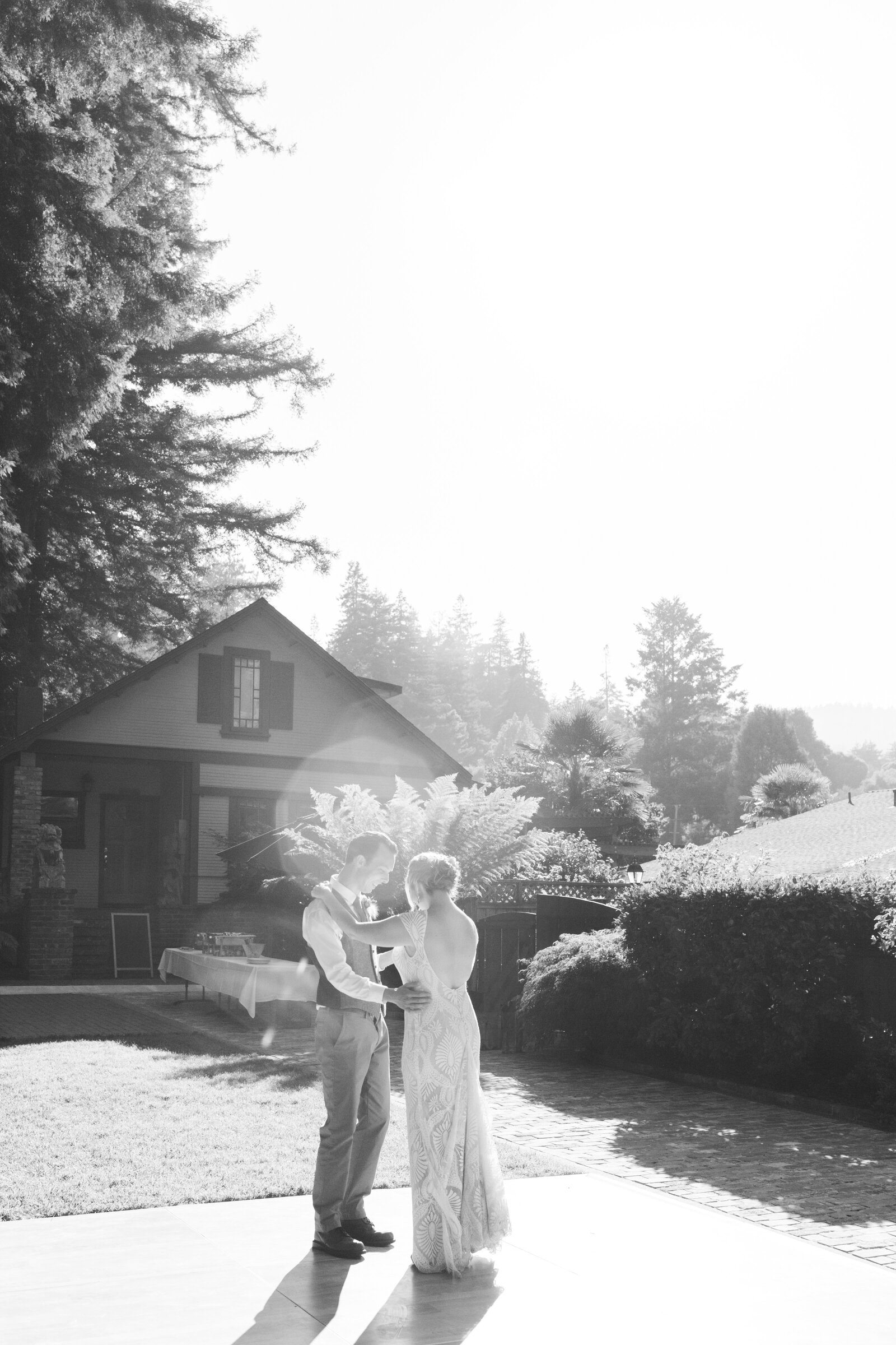 Bride and groom on their colorful wedding day in Santa Cruz, California in the redwood trees.
