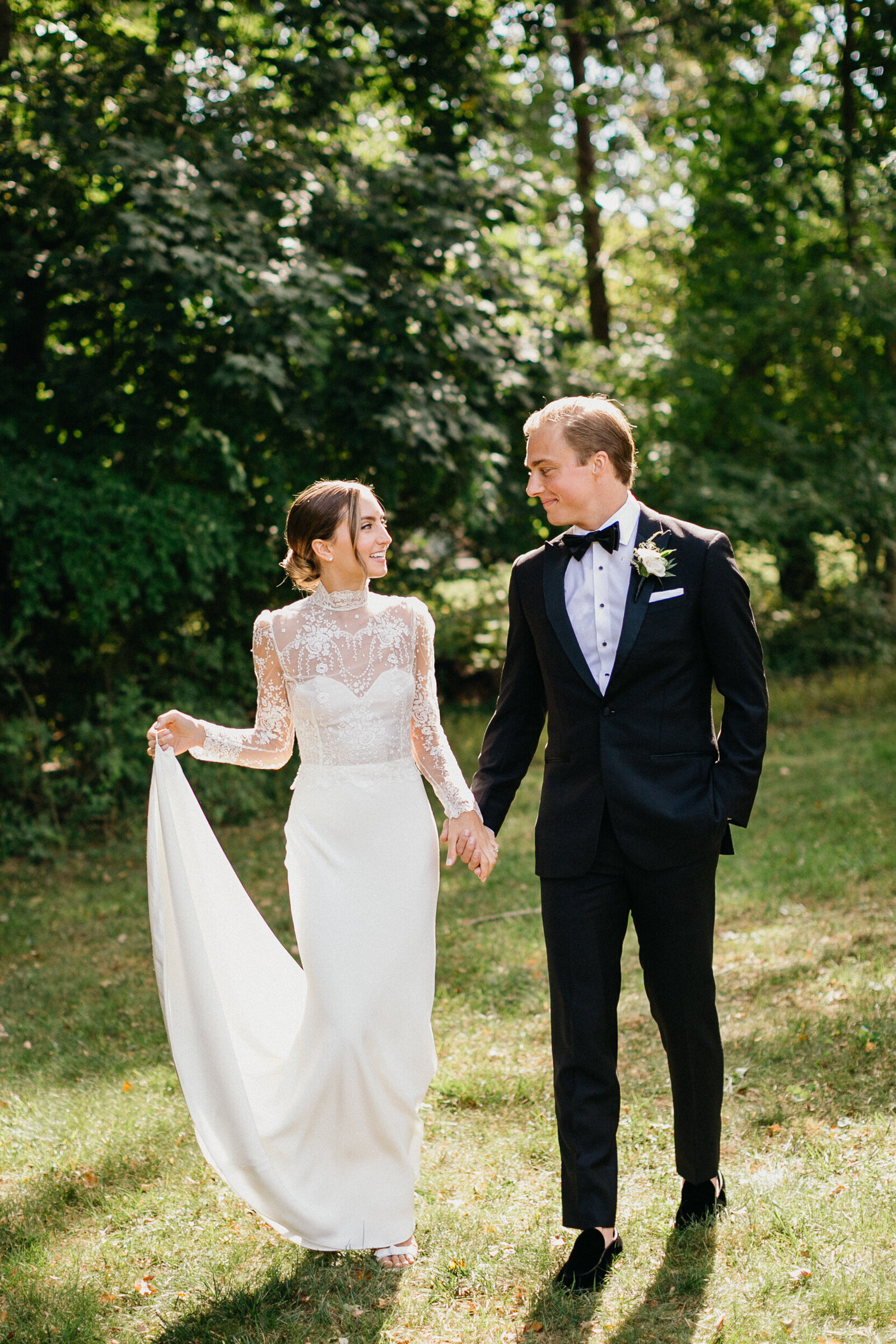 Bride walking towards an outdoor ceremony in Philadelphia, PA. 