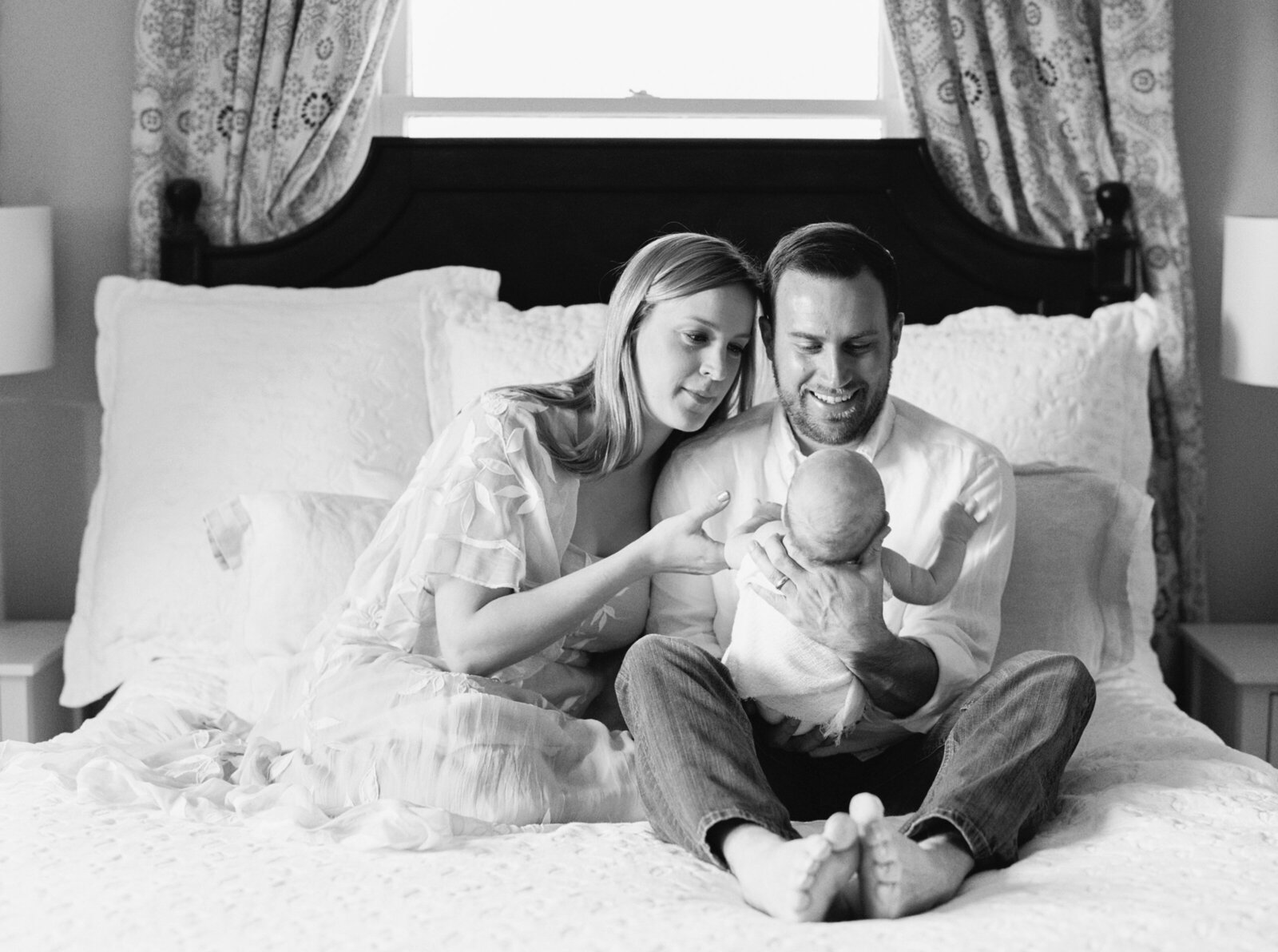 Mother and Father photograph with newborn baby