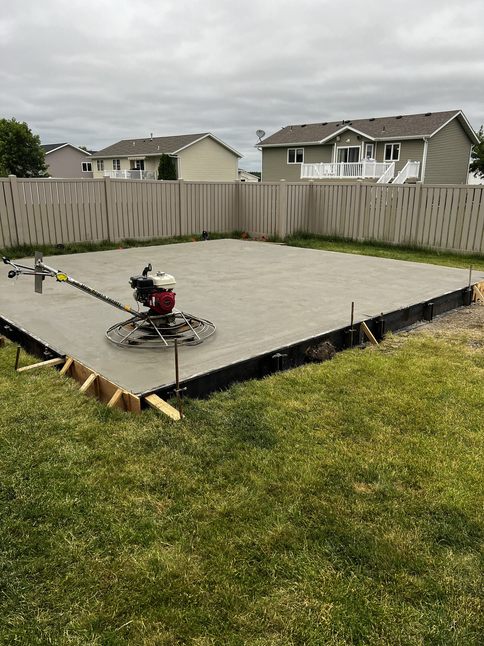 concrete slab with fence