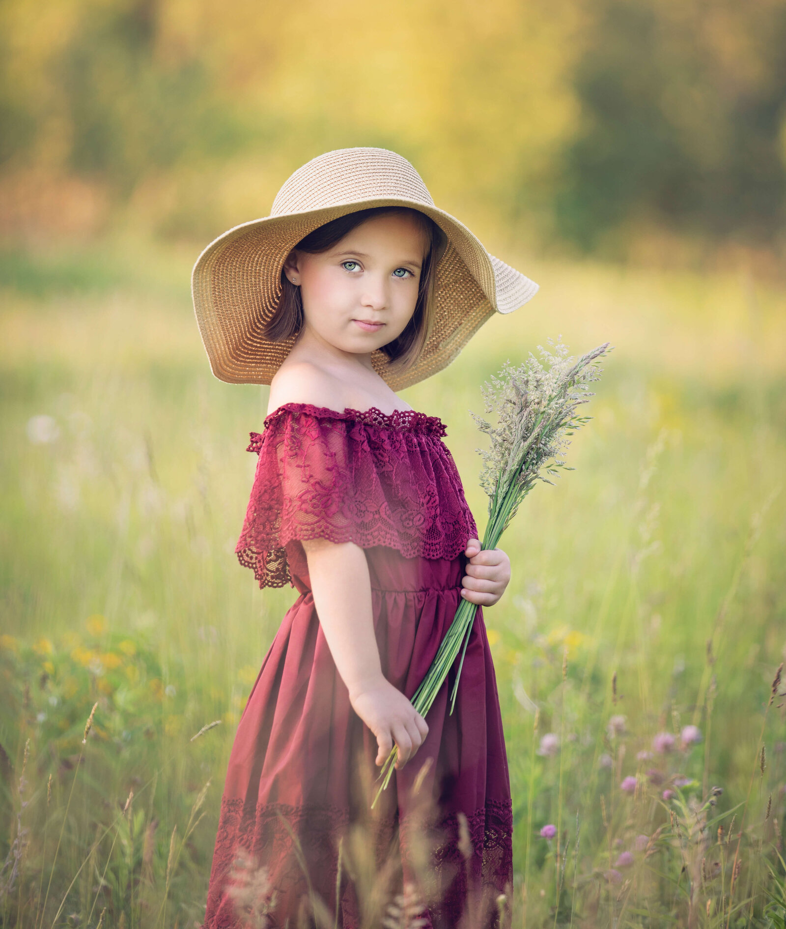 Photo of a little girl standing in a field in Erie Pa