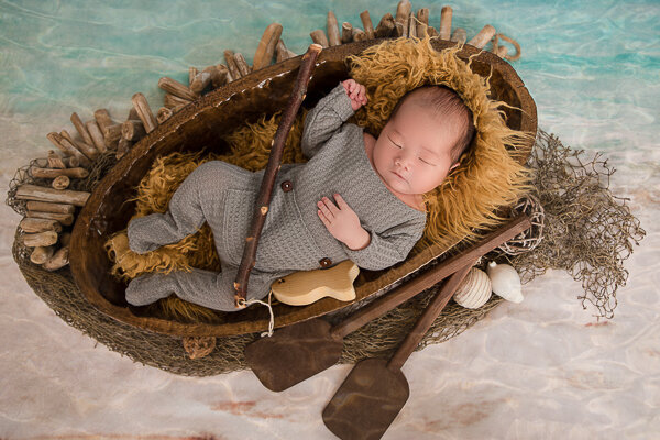 East Brunswick NJ Newborn Photographer Baby in oar boat
