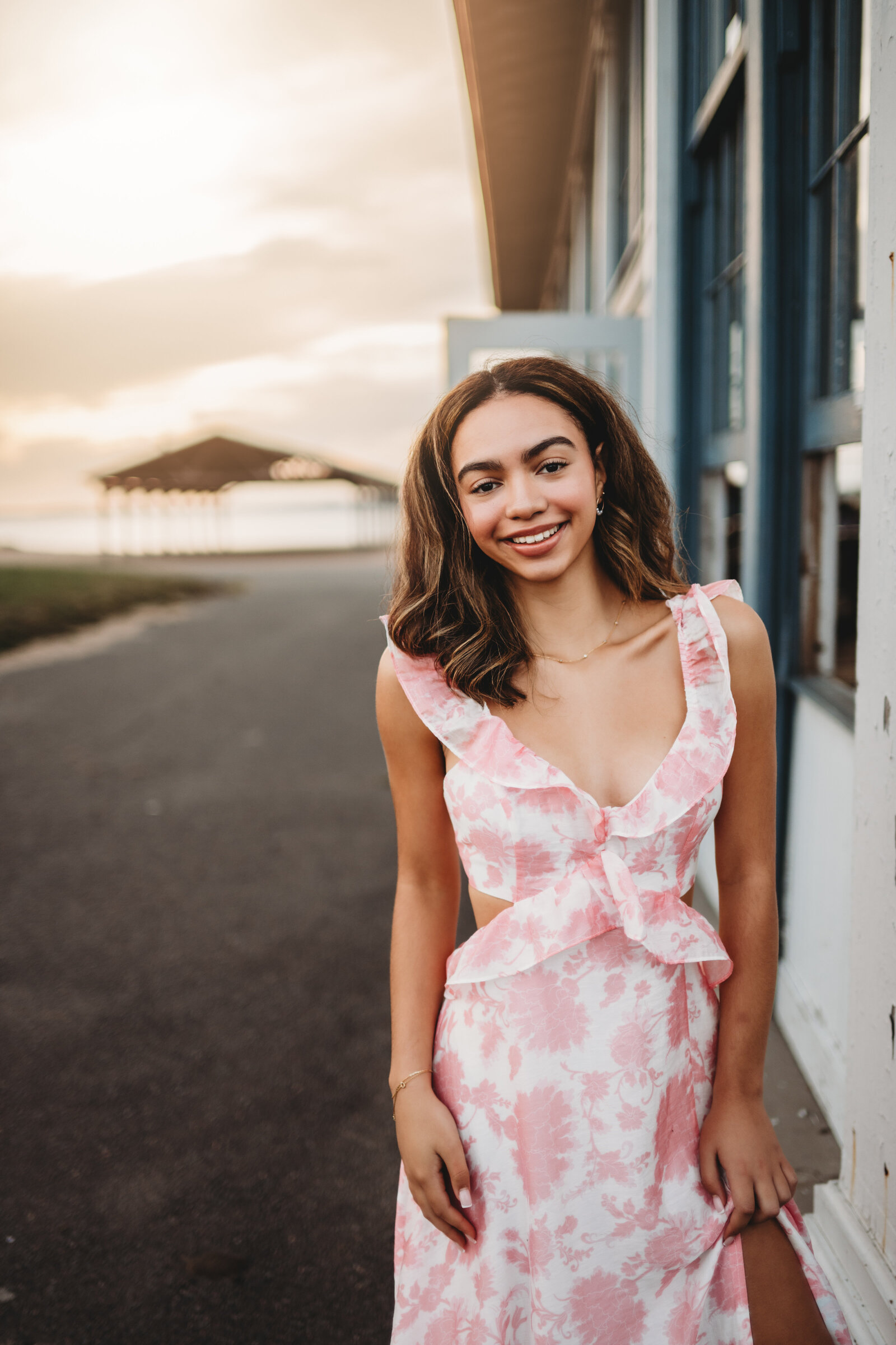 Capture the beauty of your senior year with a stunning portrait session at Lighthouse Point Park in Connecticut. This golden-hour shoot highlights natural elegance and timeless charm.