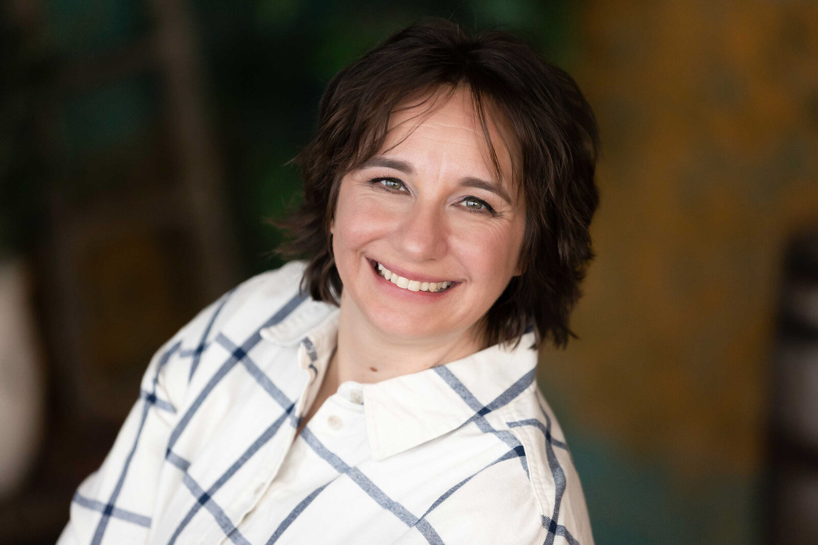 closeup photo of a woman smiling