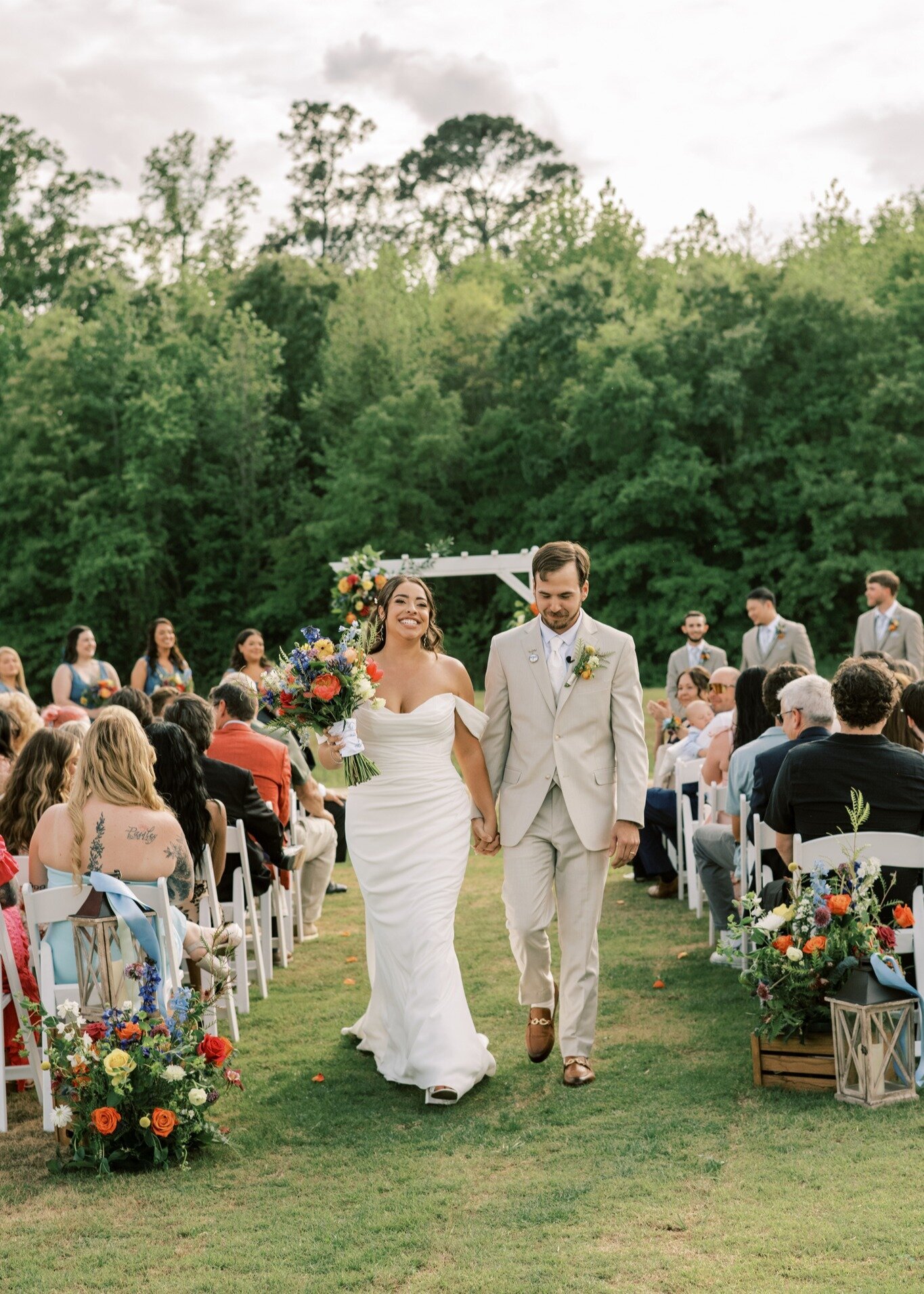 Island-Ceremony-Couple-Walking-The-Legacy-at-Willow-Pond.JPG