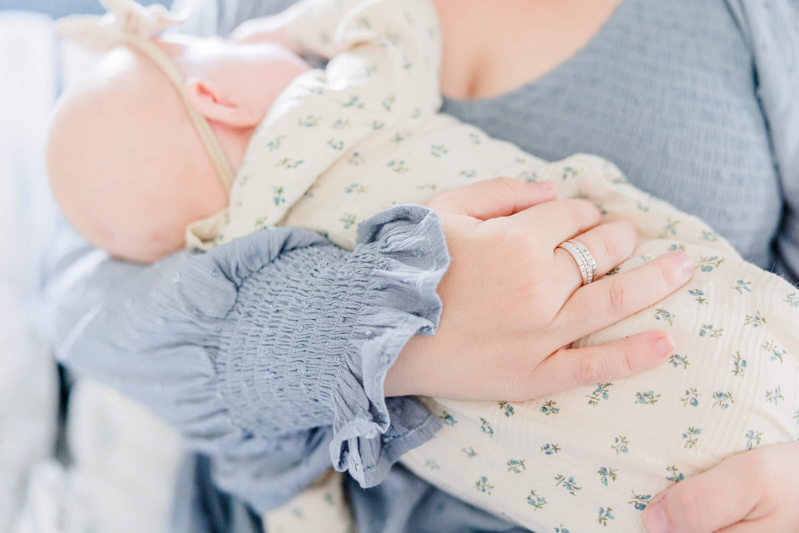 Mom holds baby close