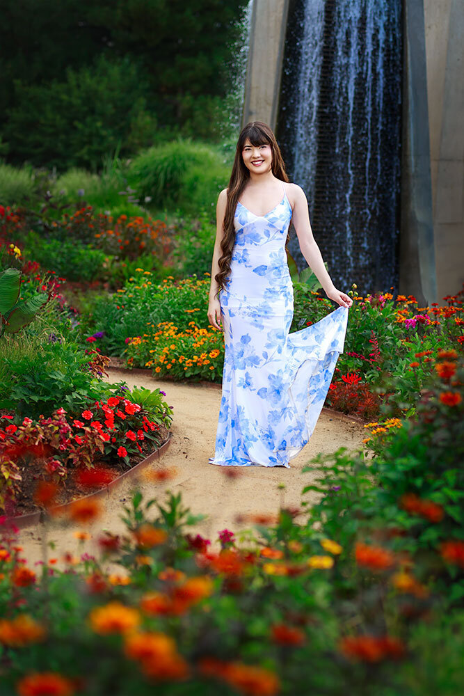 vibrant-senior-portraits-colorful-warm-flowers-red-orange-waterfall-breathtaking-gorgeous