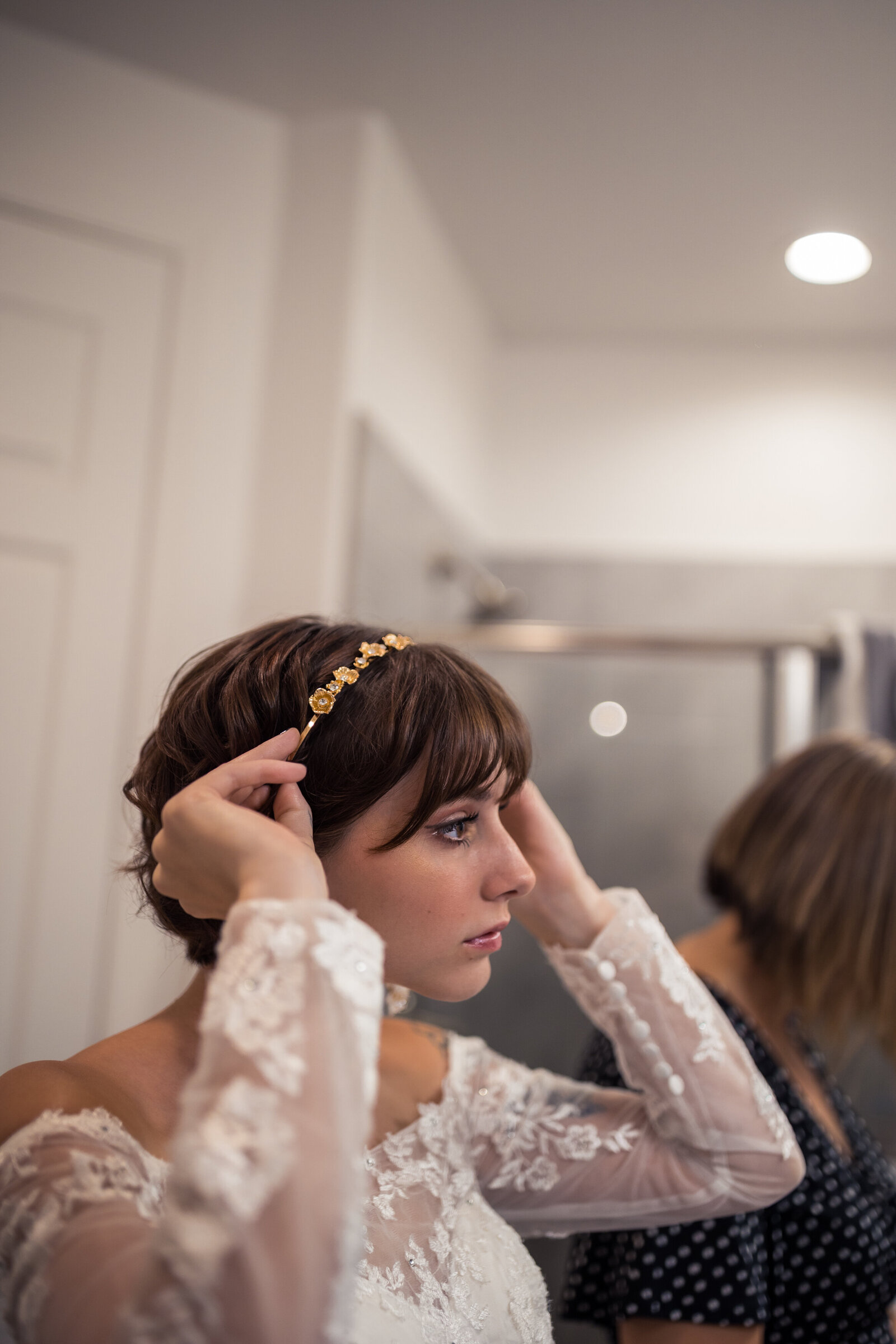 bride getting ready for elopement at an airbnb in flagstaff, arizona