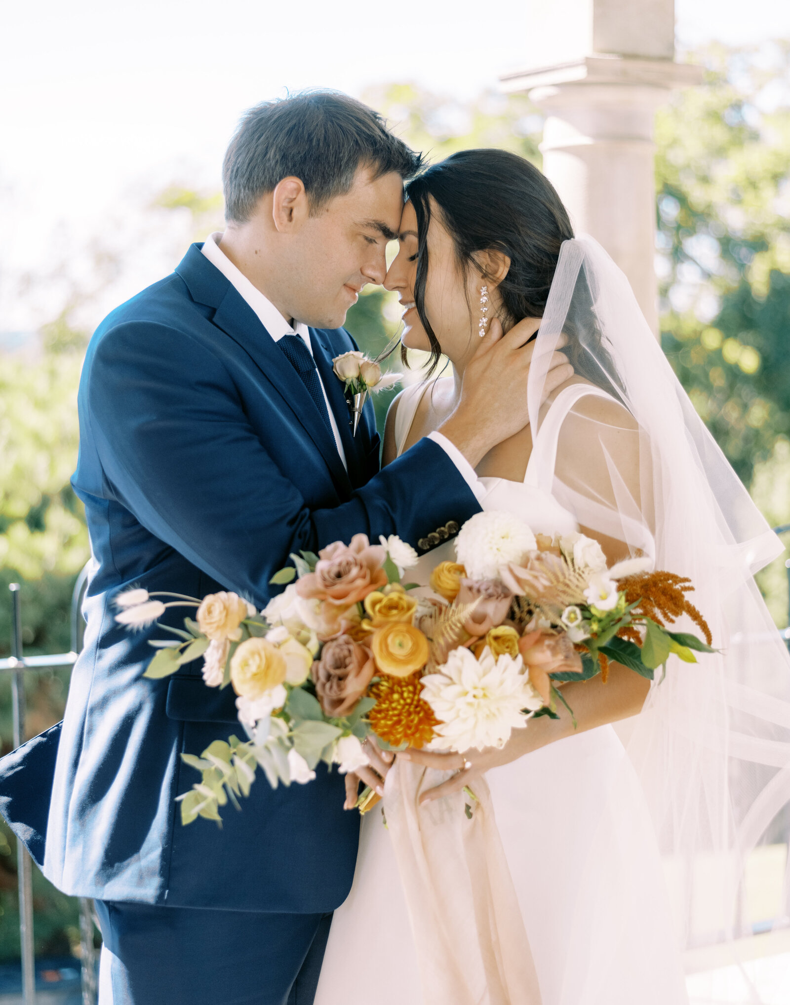 bride and groom hold each other