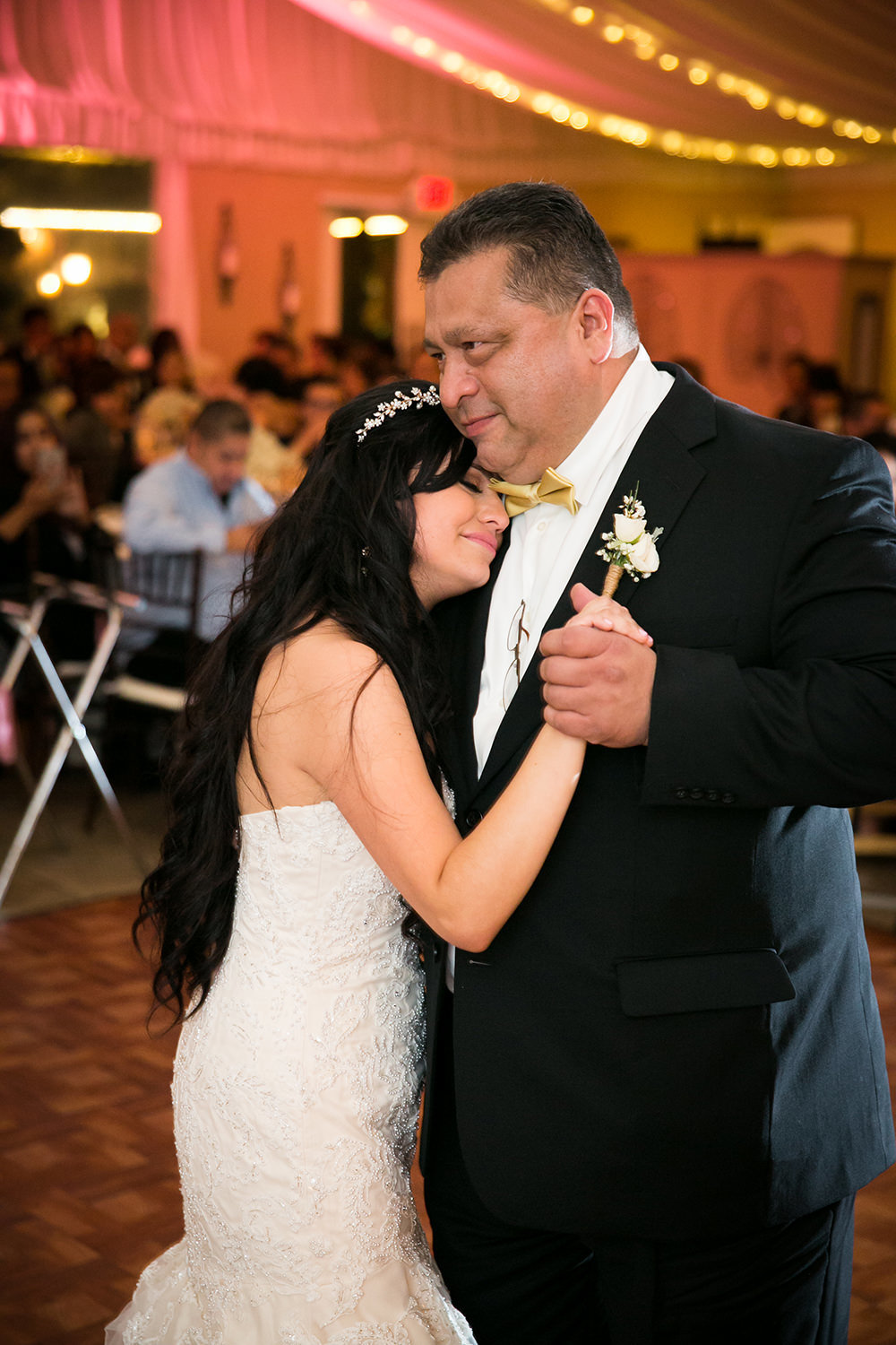 bride crying at father daughter dance