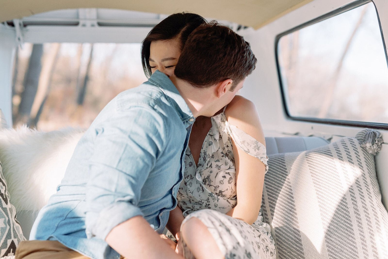 couples embrace at cherry beach toronto engagement withwendy sewing youtube volkswagen camper van jacqueline james photography