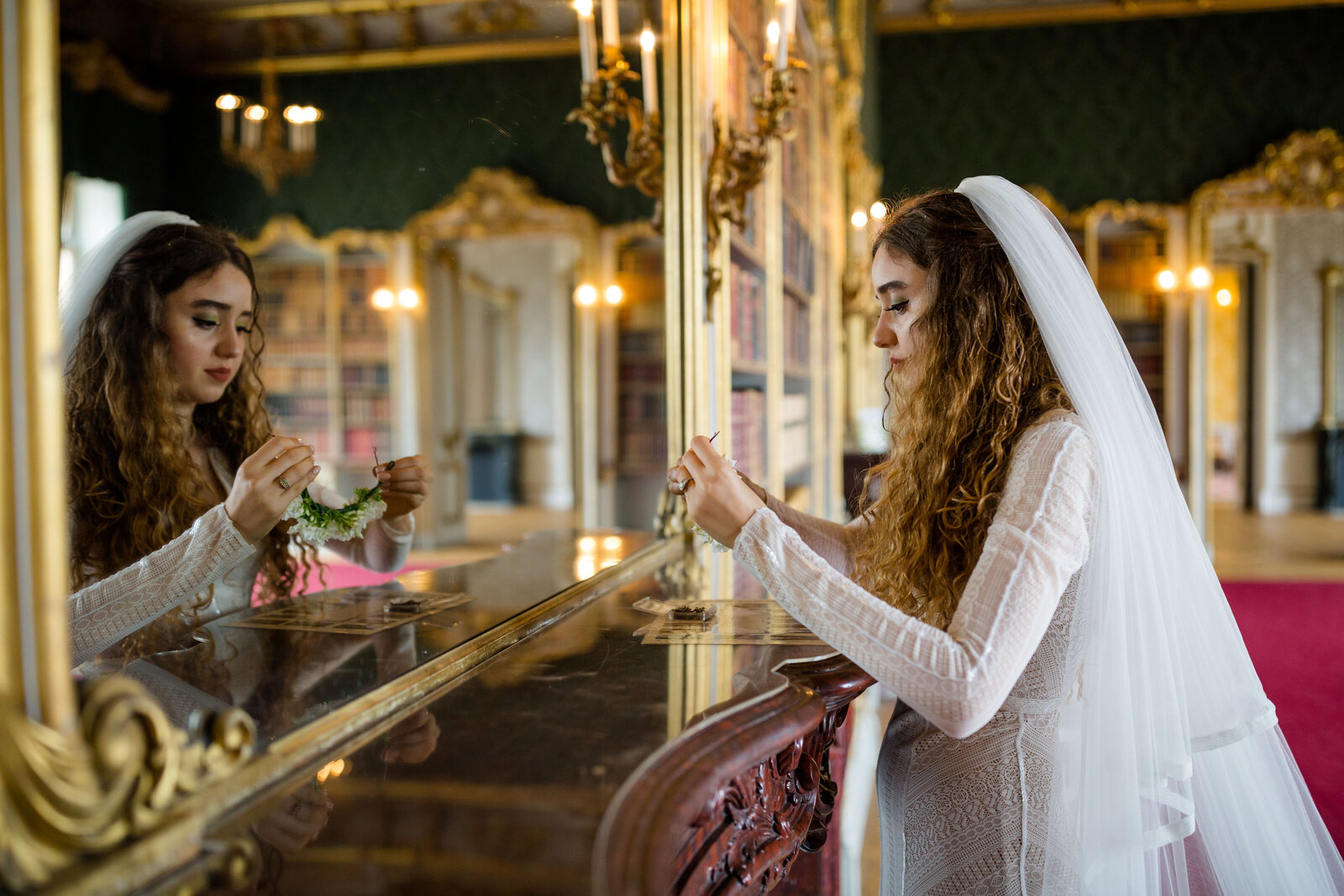 A photo of a Bride stood in front of a mirror