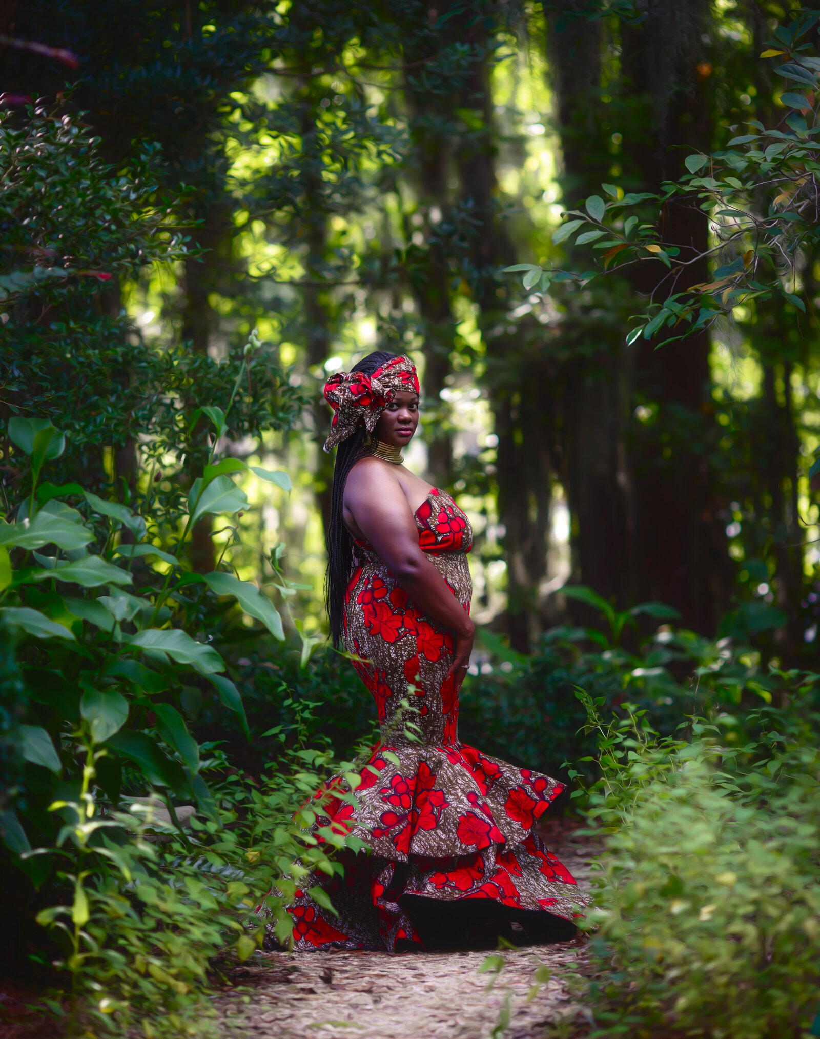 Savannah Boudoir Photography and Glamour showcases gorgeous black woman in african inspired gown in Savannah in woods