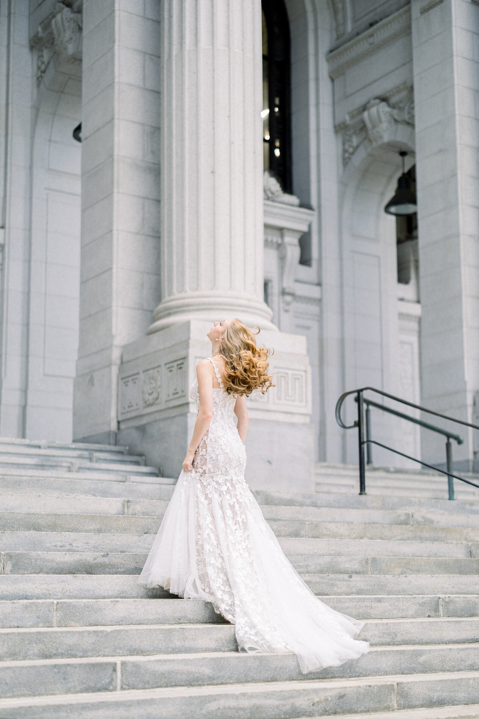 bride walking up grand staircase