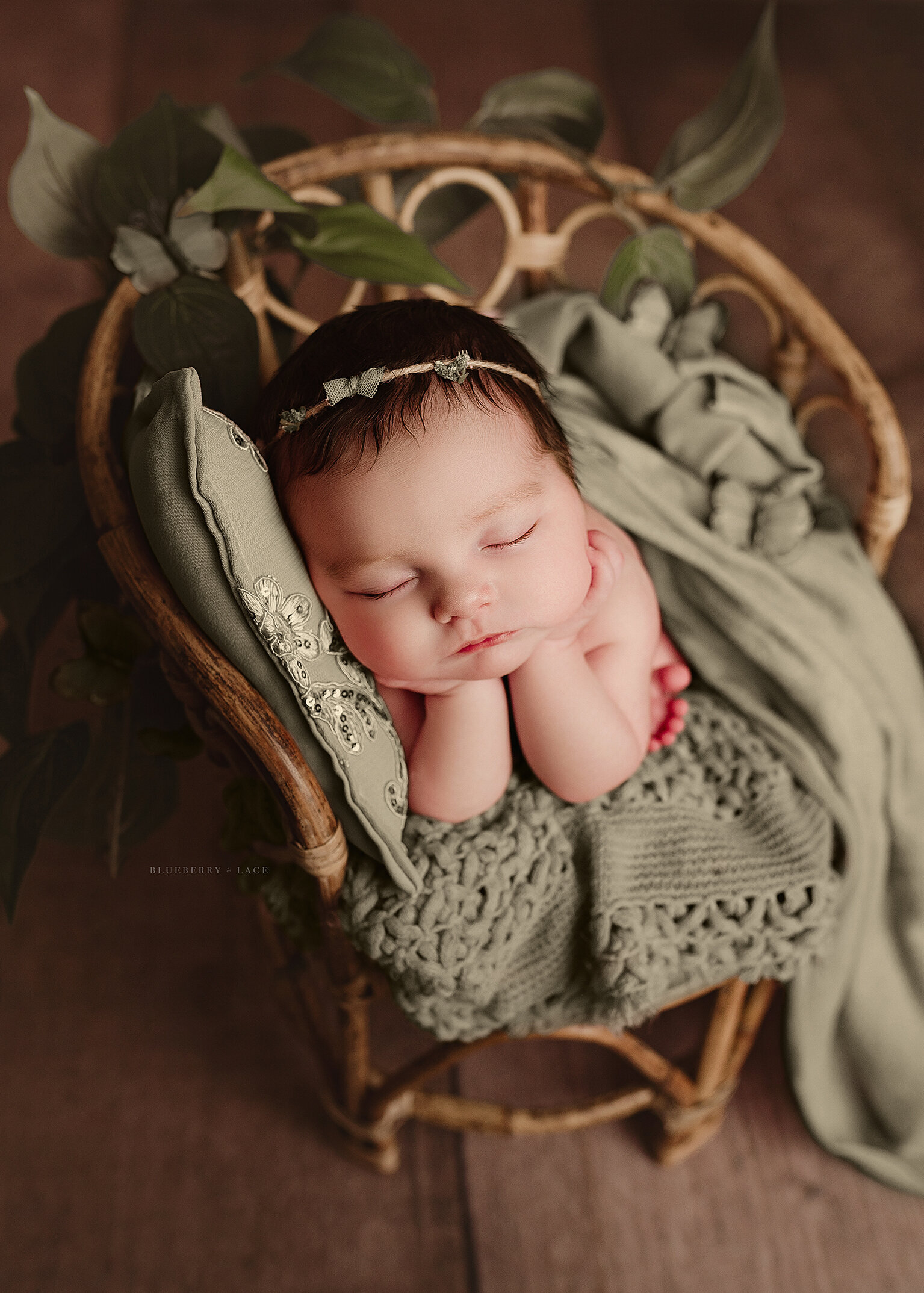 baby girl in green at blueberry and lace photography serving Oswego ny and surrounding areas such as Syracuse ny