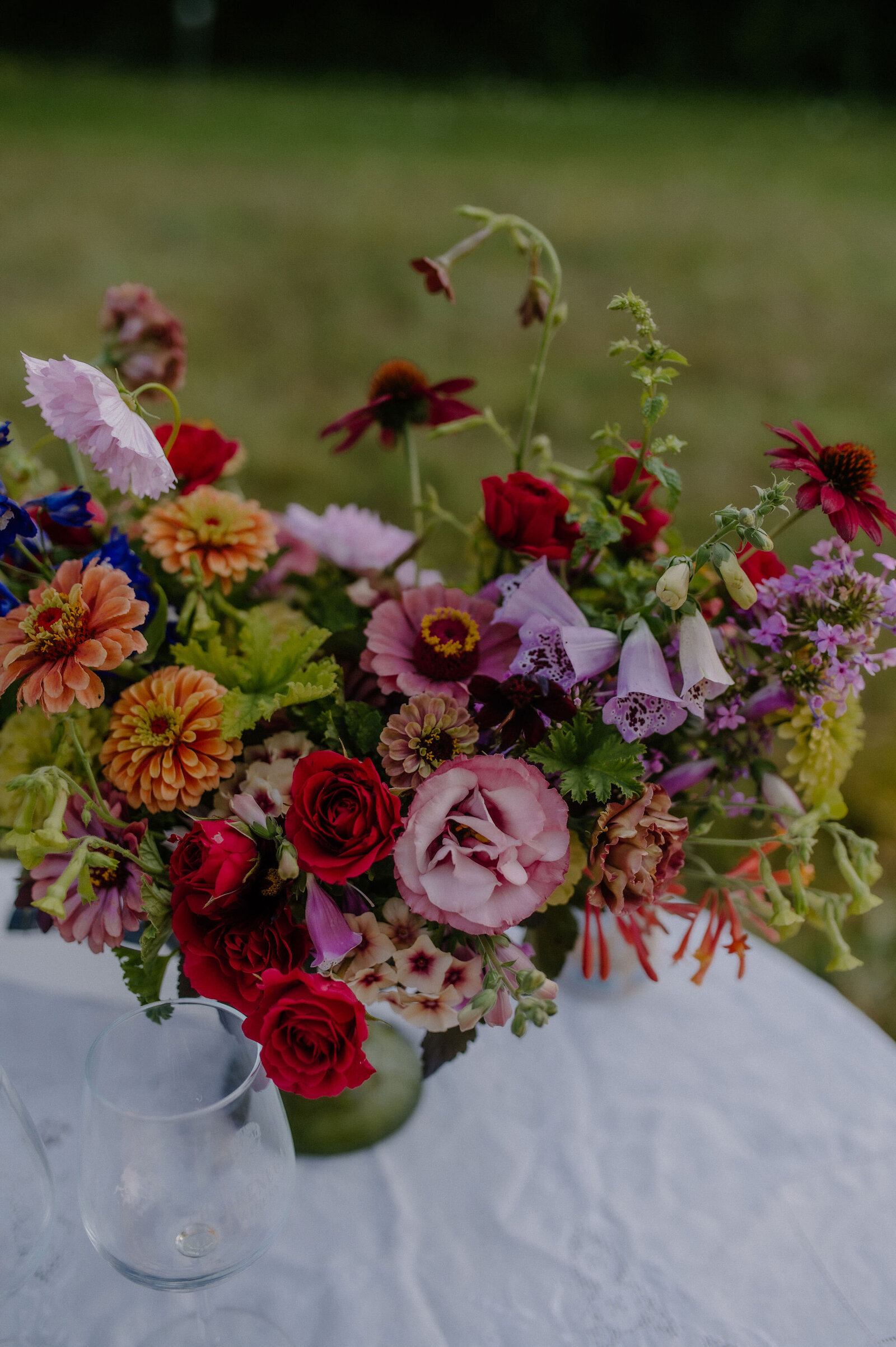 colorful floral arrangement bouquet with purple, red, orange, pink flowers