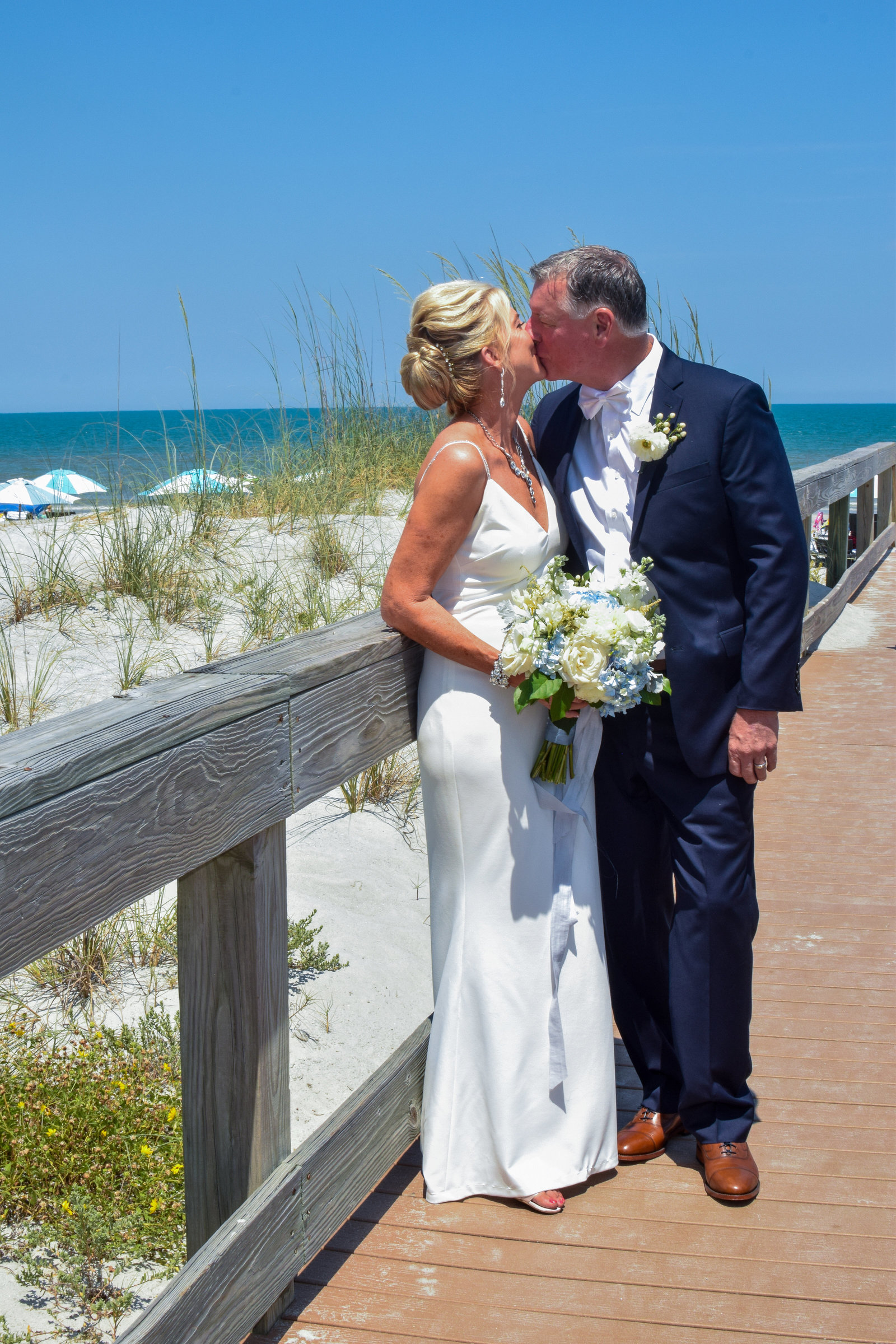 Wedding Bride & Groom beach boardwalk Portrait One Ocean Resort Jacksonville Florida