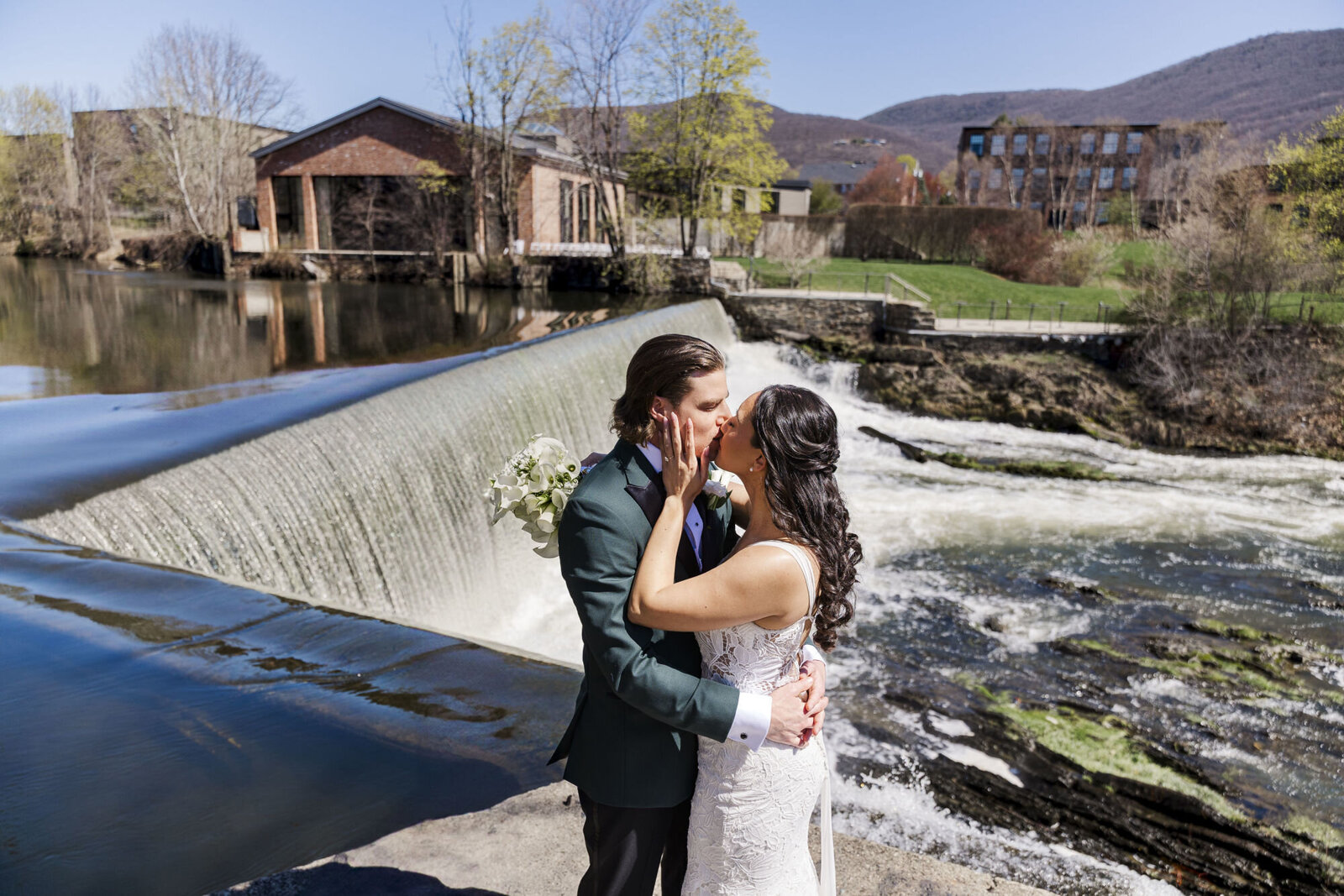 Wedding photo at the Roundhouse with Beacon Falls in the background in the Hudson Valley