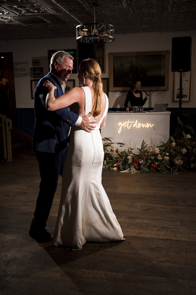 bride dancing with her dad