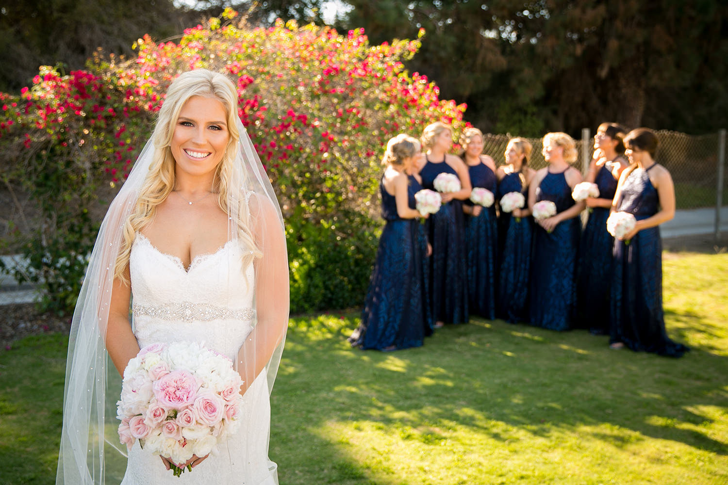 bride with bridesmaid in background