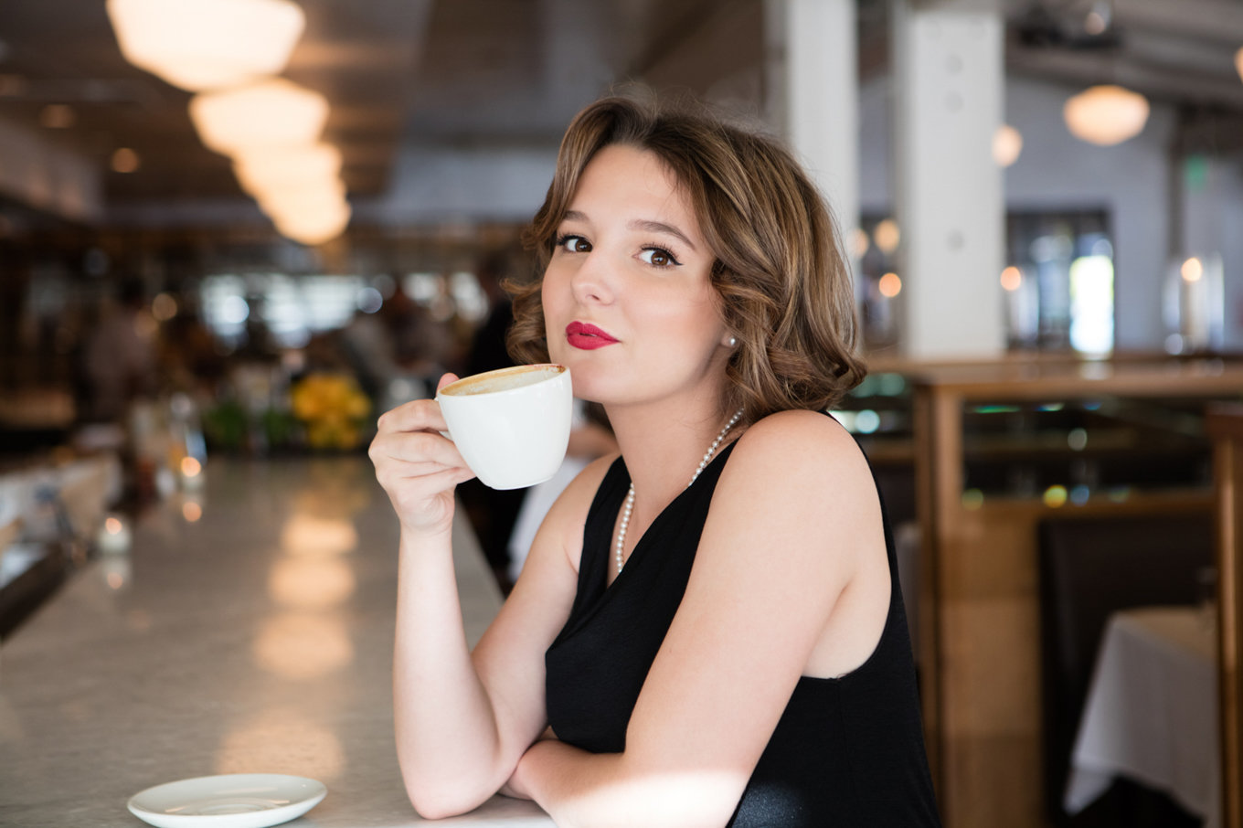 Beauty and Commercial Girl with Coffee
