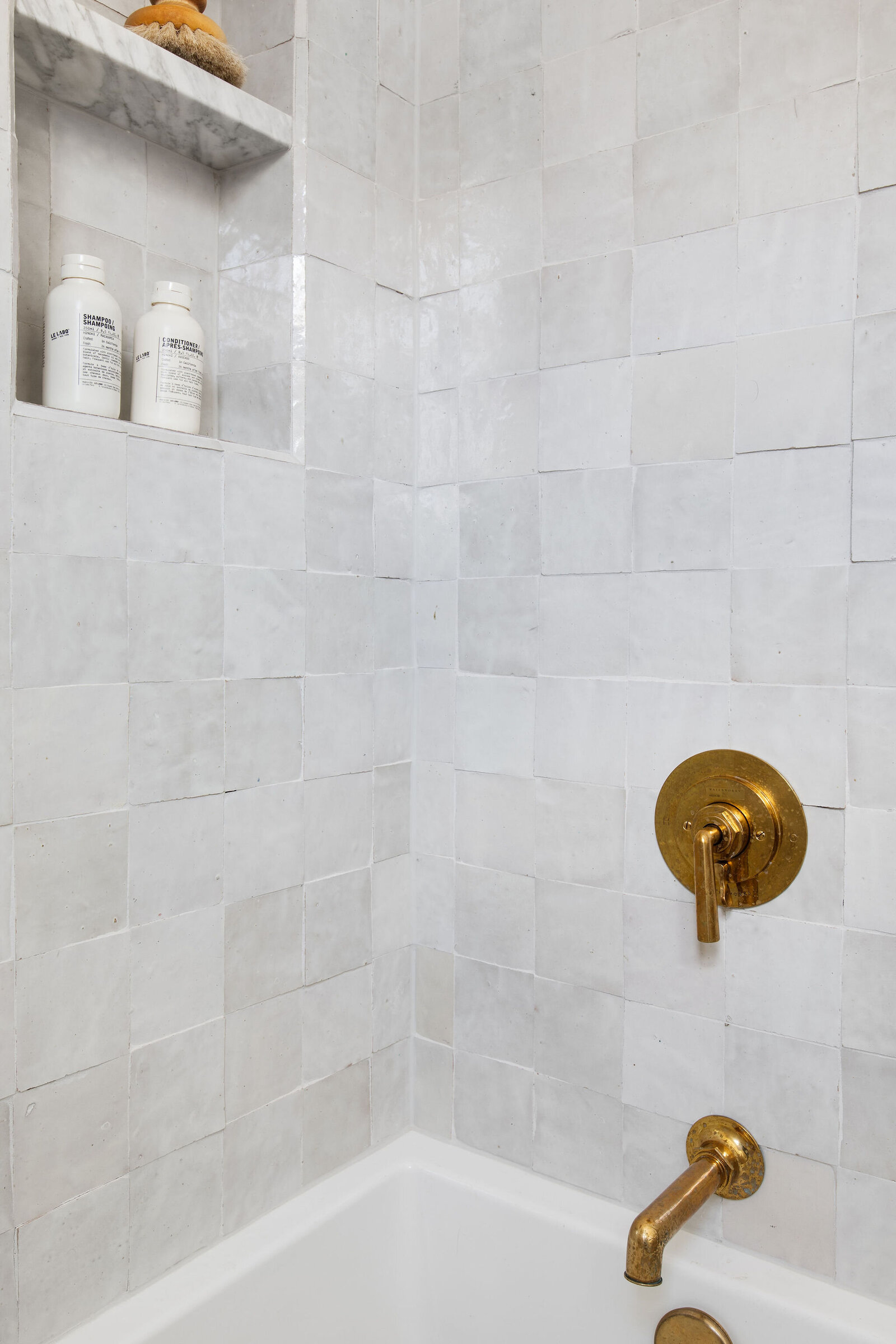 White Zellige Square Tile in Shower with Brass Fixtures_Nuela+Designs
