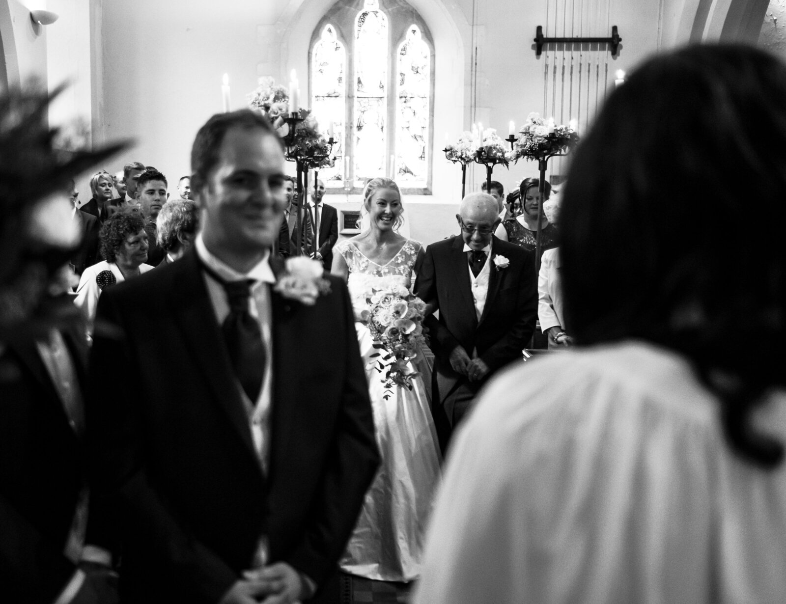 Sian walking down the aisle at her Berkshire wedding