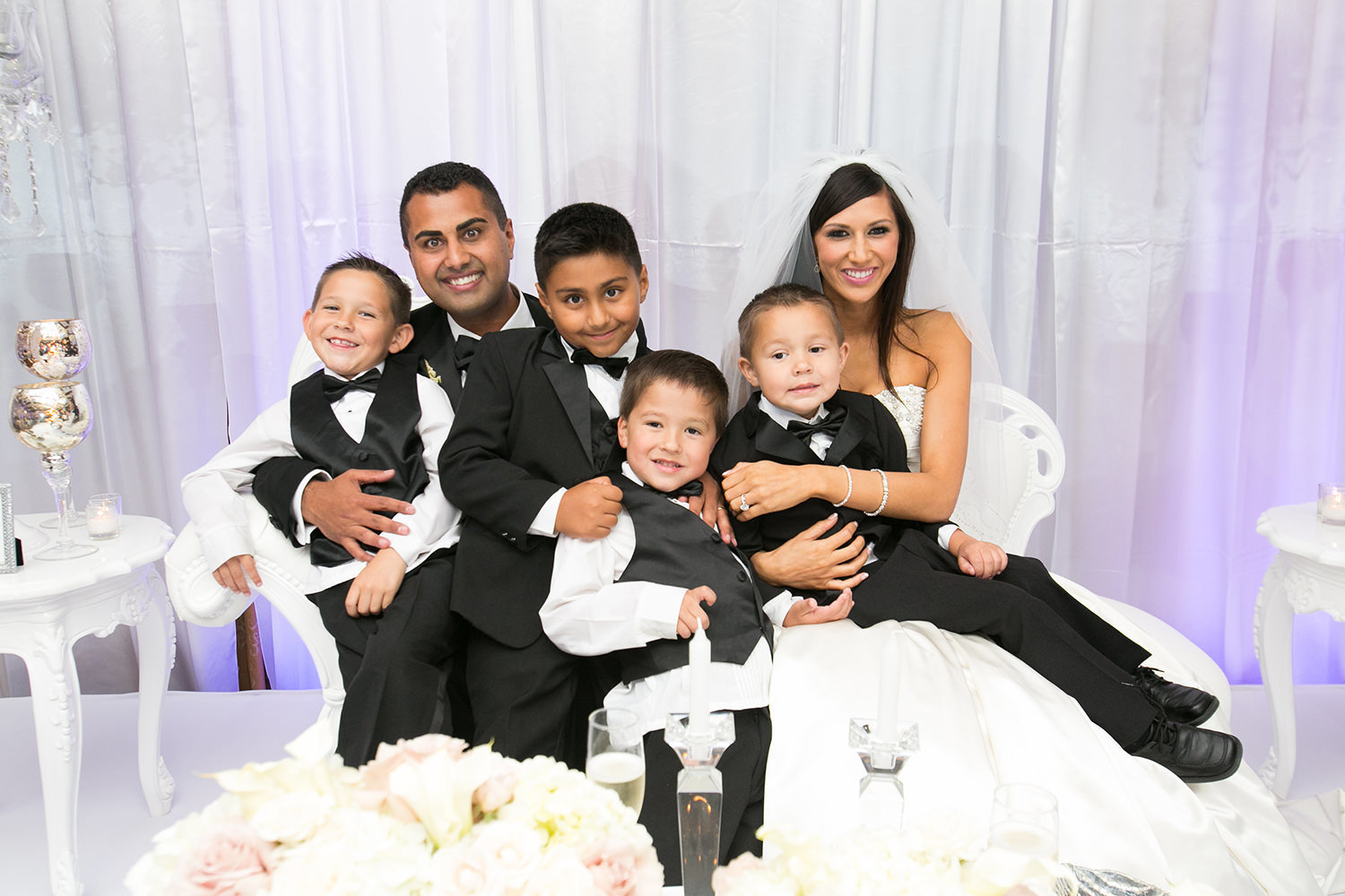 reception room at the crosby club bride and groom with kids