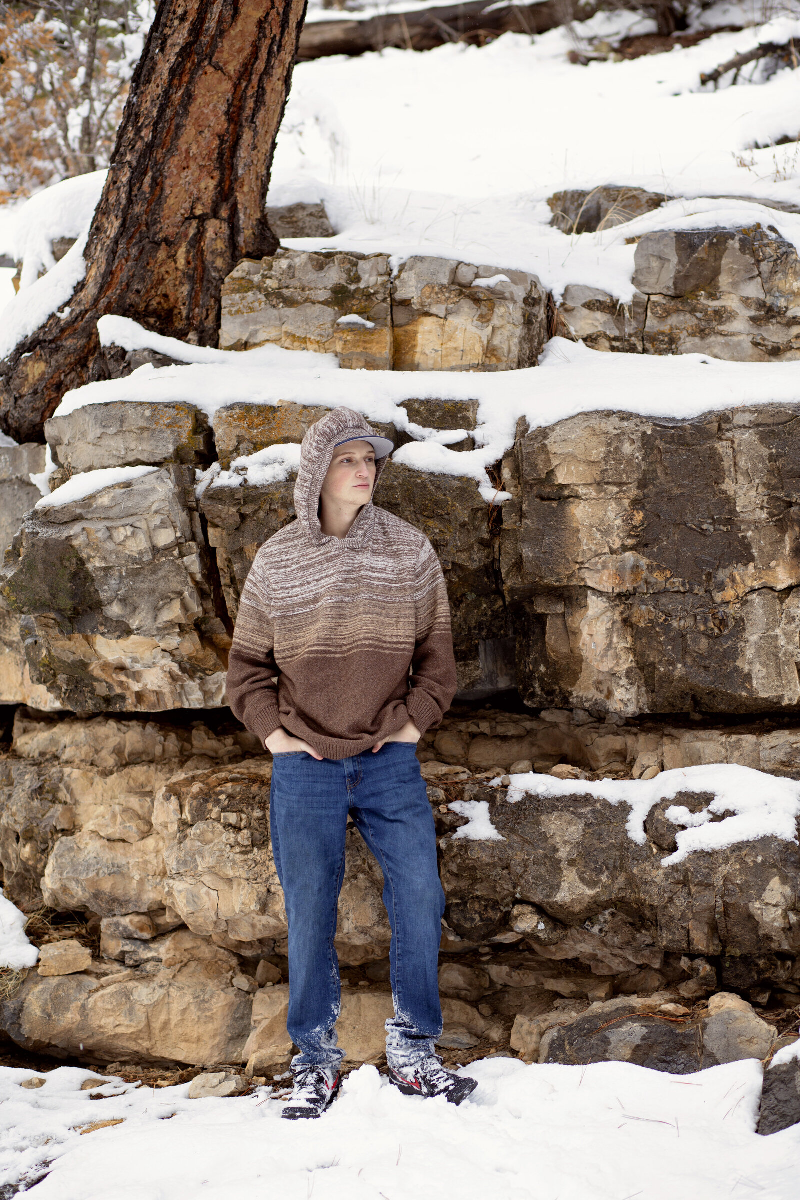 Senoir-Boy-Session-with-rocks-and-snow