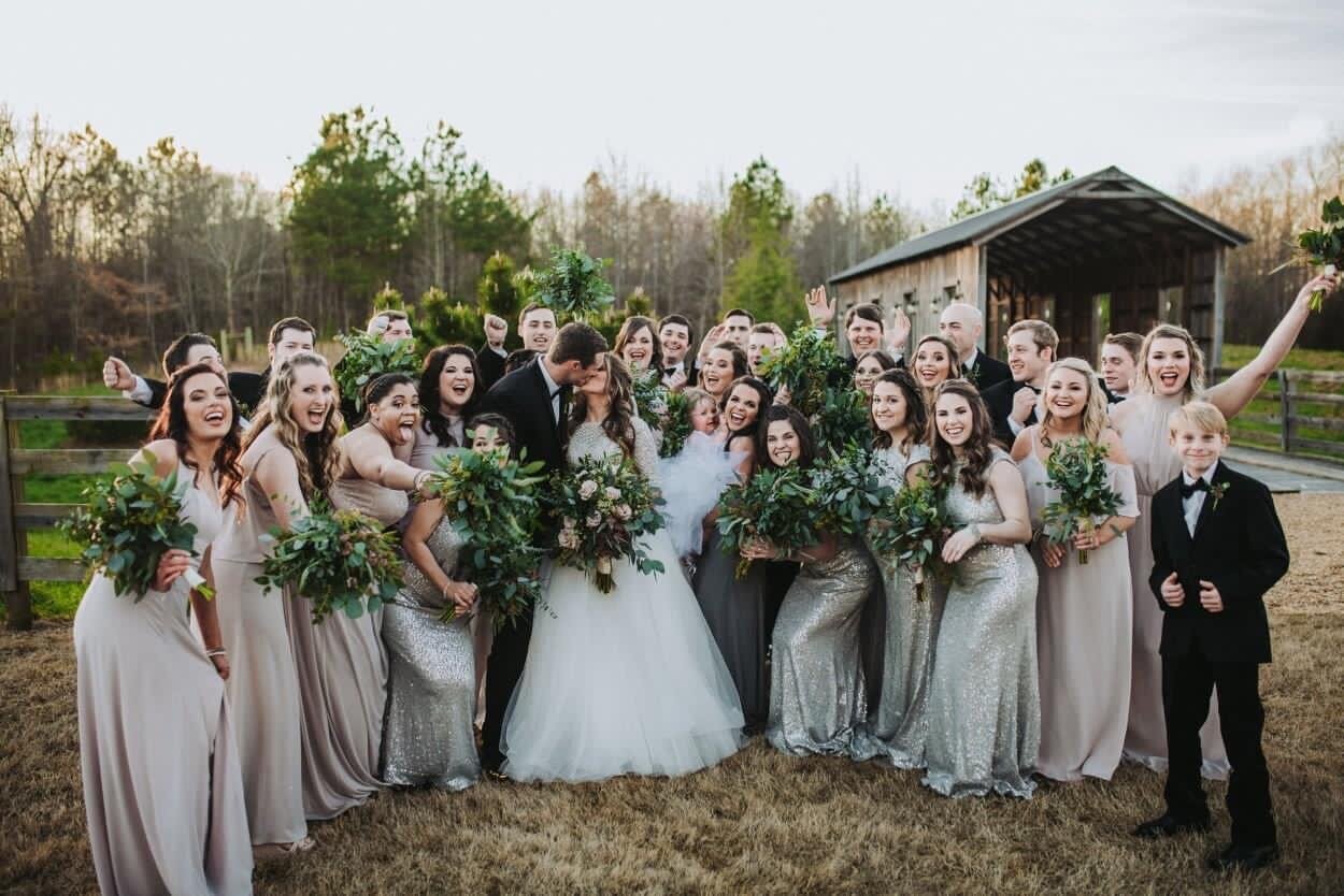 Wedding group shot by bridge