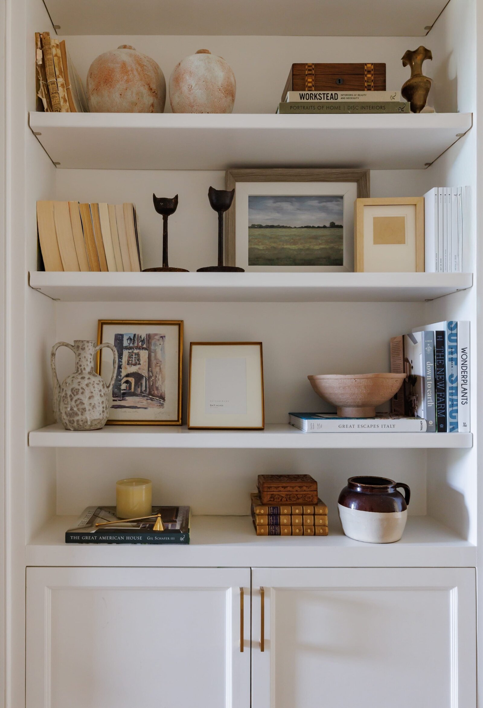 vision and hammer neutral styled shelves on white built-ins
