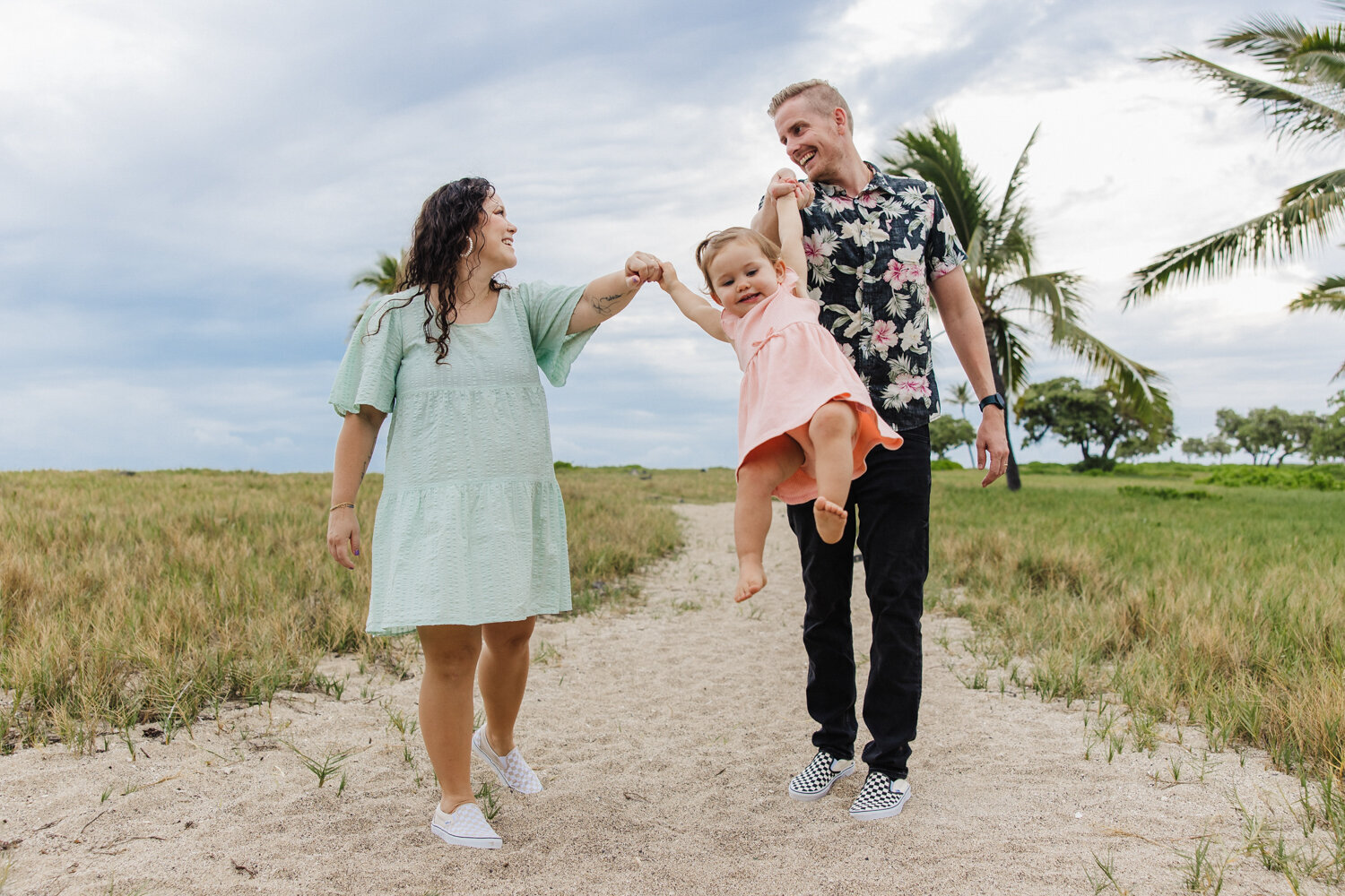 family swinging daughter