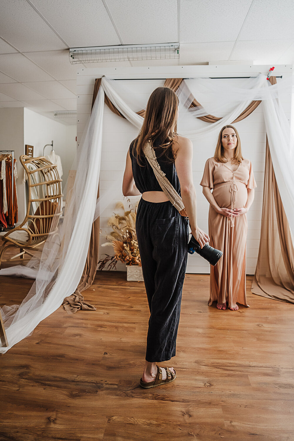 photographer headshot in studio with maternity model