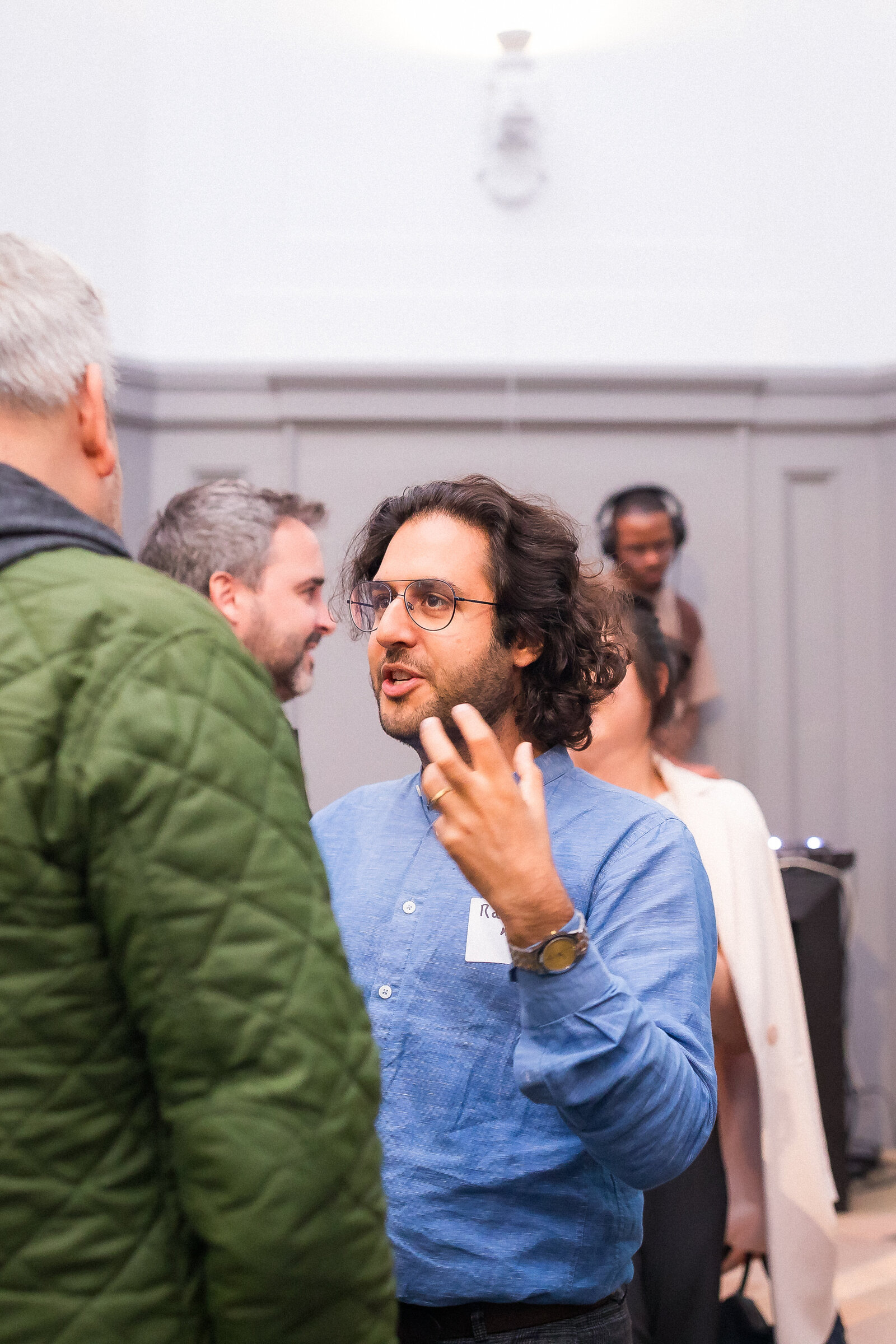 Guests in conversation during the Holy Shift event hosted by ACTS 17 Collective.