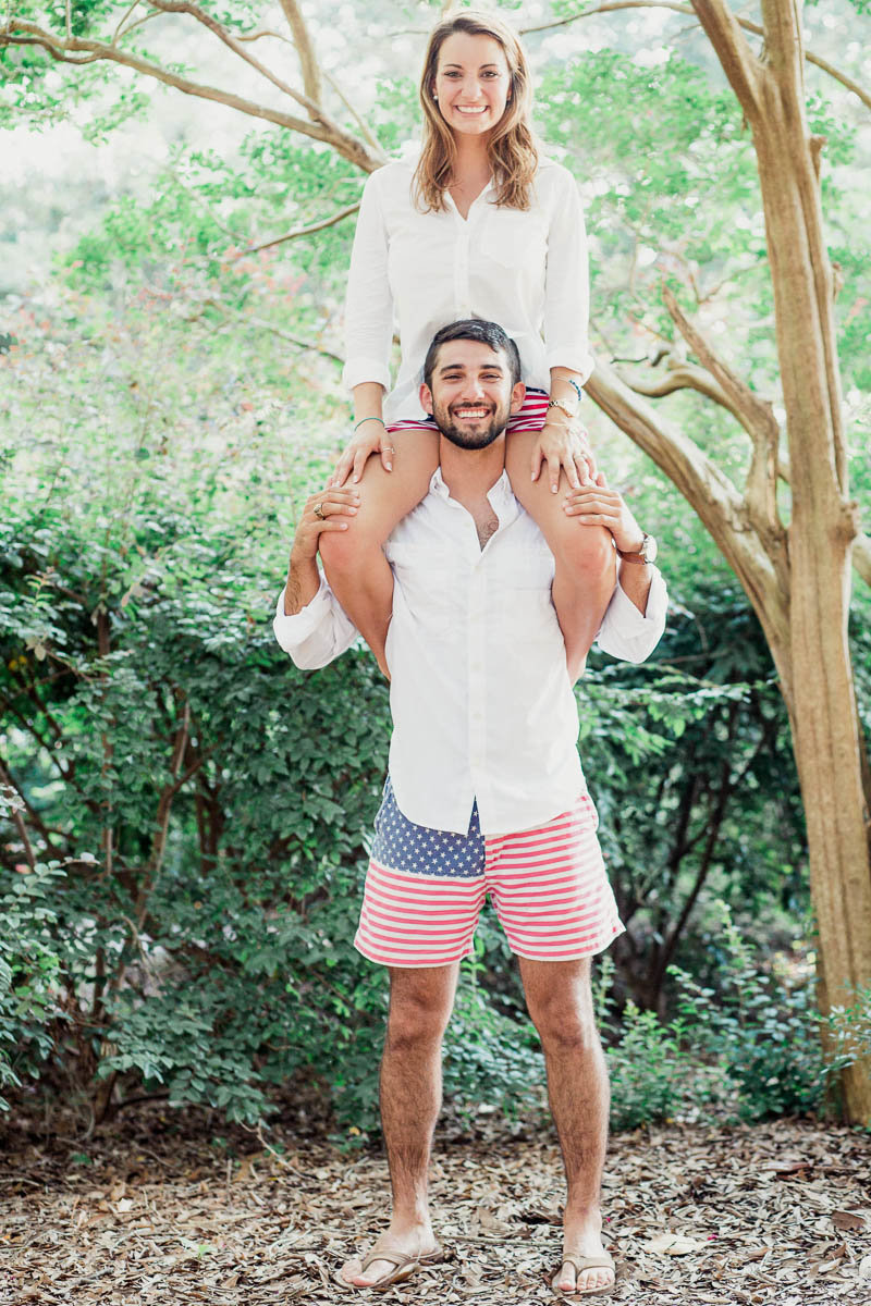 Engaged couple doing a goofy pose with Chubbies American Flag shorts, Hampton Park, Charleston, South Carolina