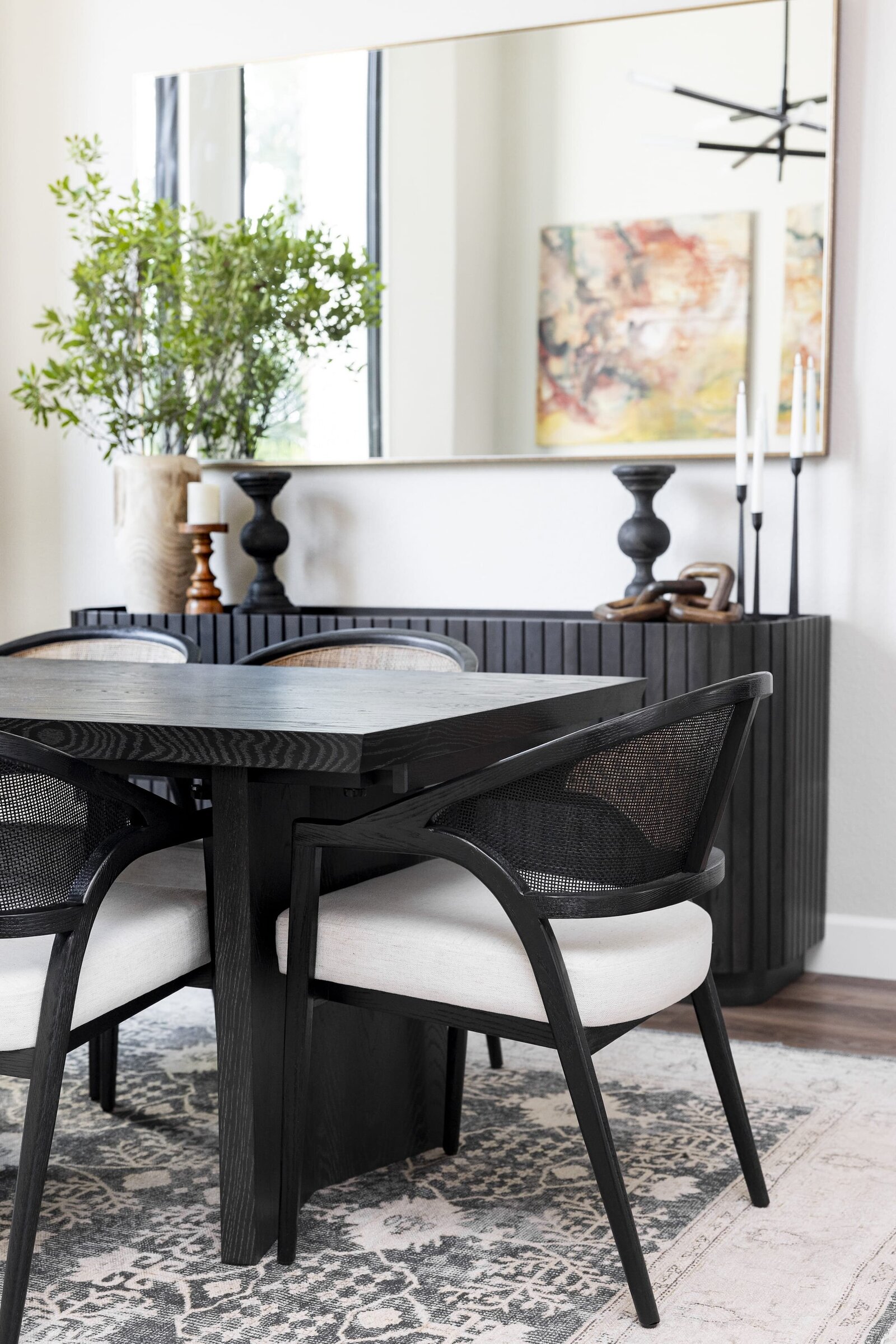 dewine design interiors windermere full house renovation dining room with black table and accent rug