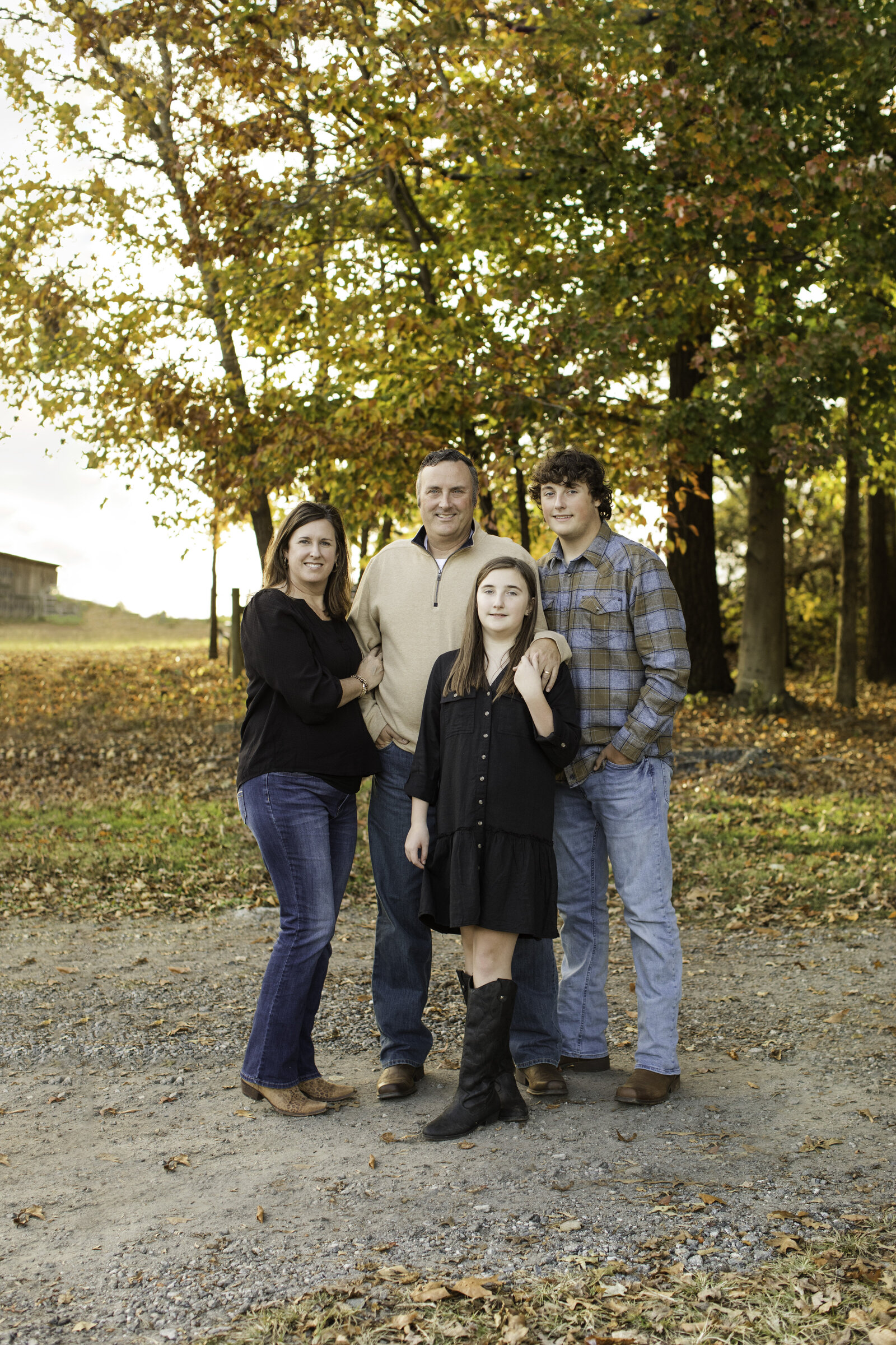 family of four on a farm