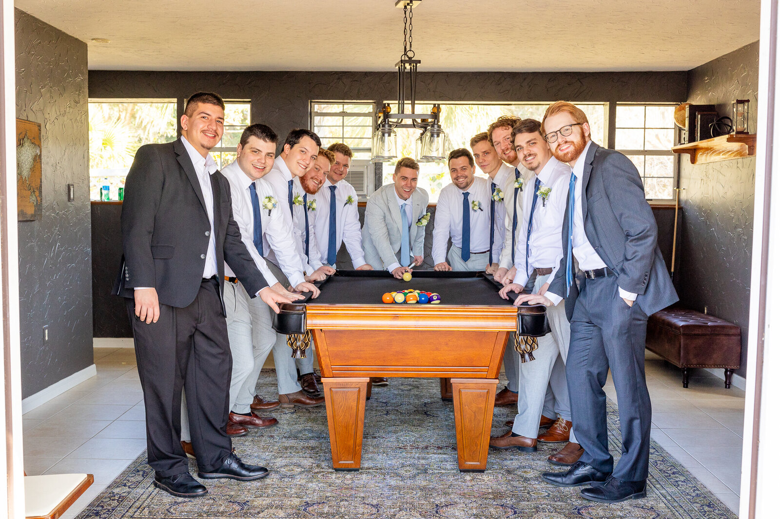 groomsmen party playing pool