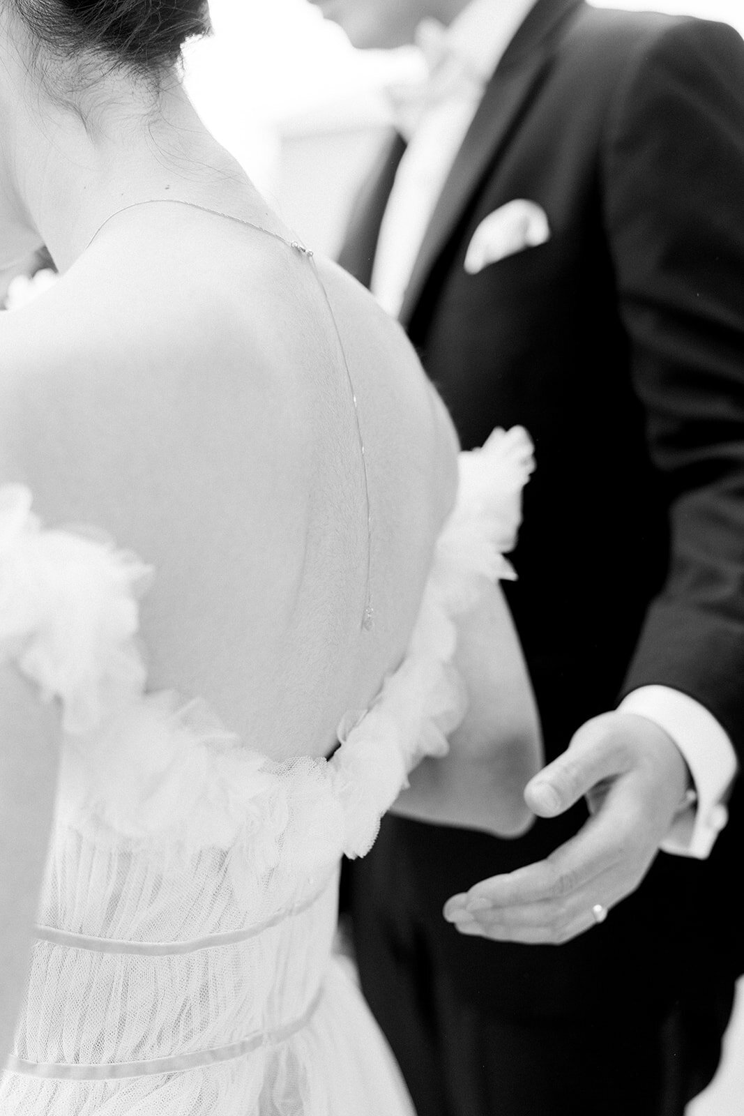A heartfelt close-up of the bride and groom sharing an intimate moment at their wedding at Stanford Memorial Church in California.