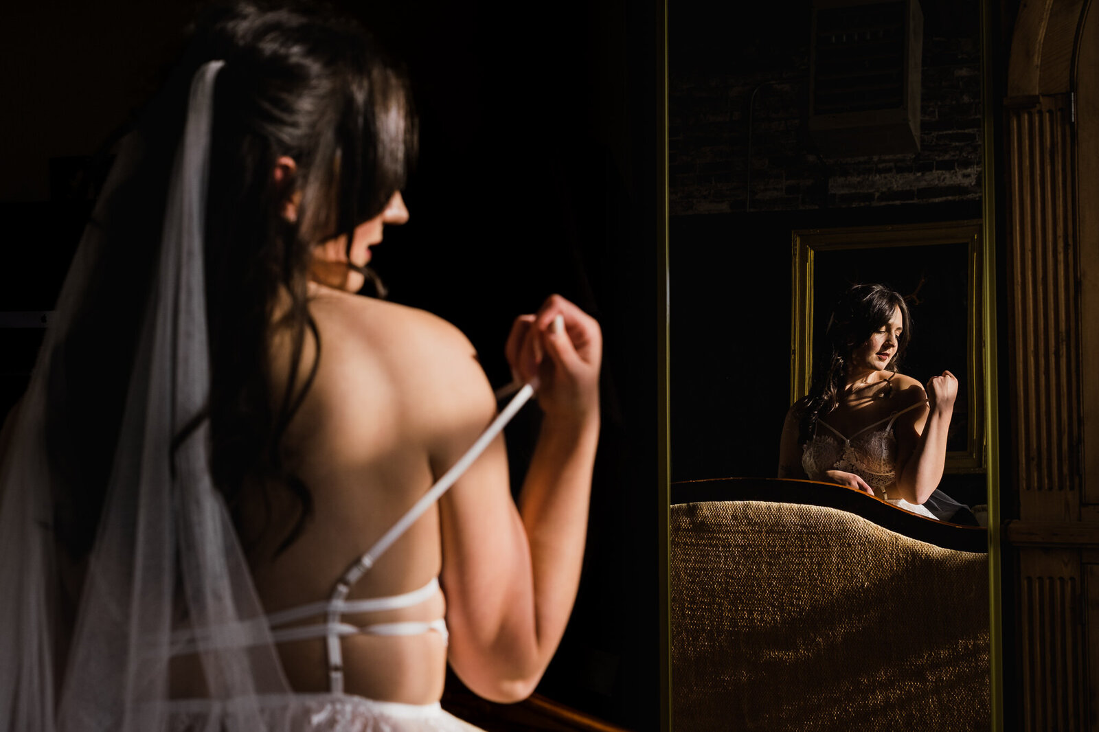 Bridal boudoir in a mirror by a Knoxville Boudoir Photographer