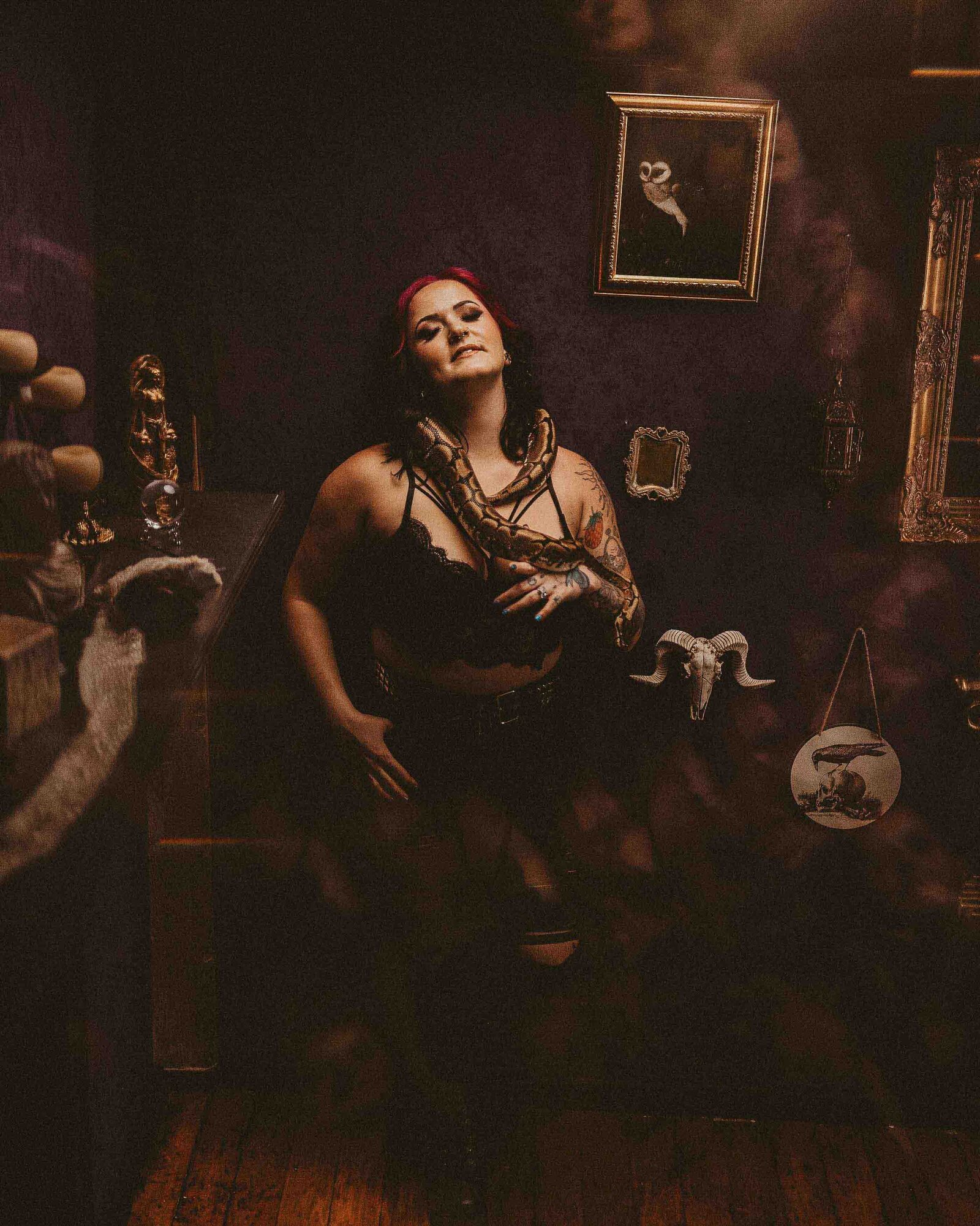 fearless woman with a snake on her neck