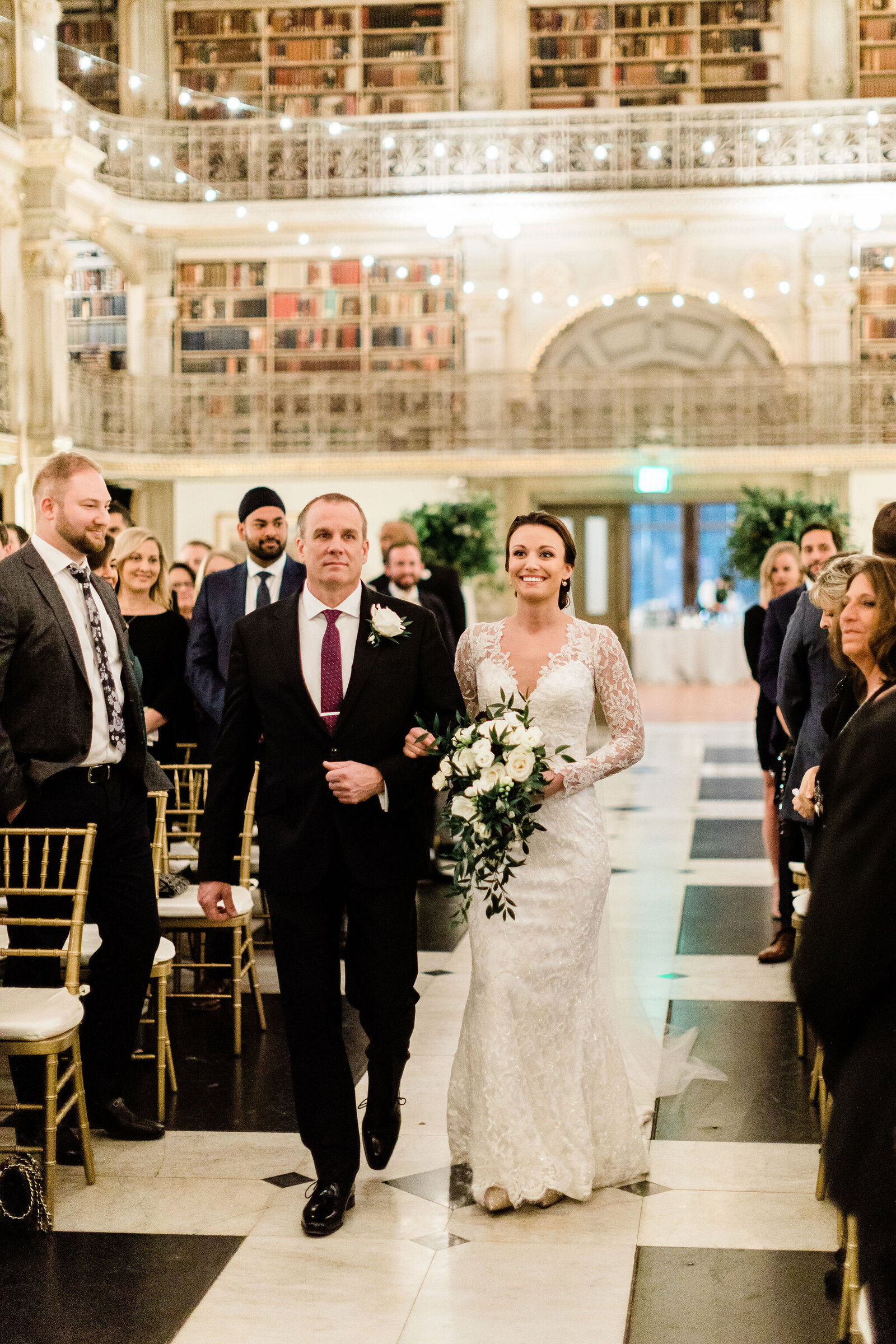 Bride Walking Down the Isle | The Peabody Library Baltimore MD | The Axtells Photo and Film