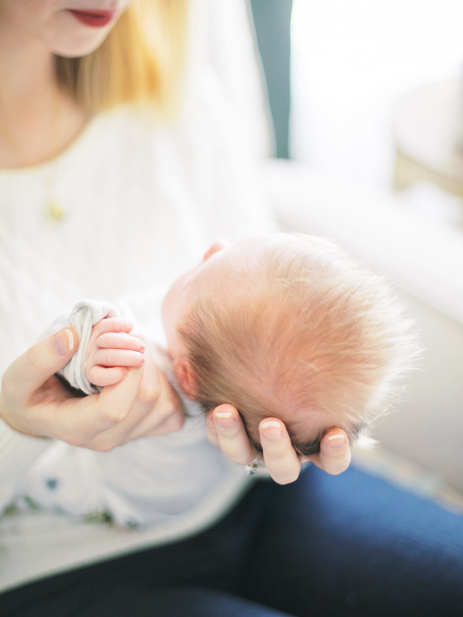 New mom in Portland holds baby girl